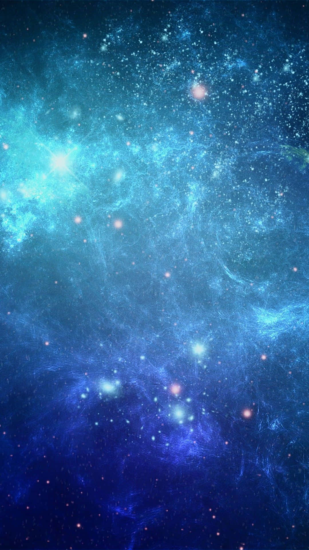 Blue Stars 桌布 壁紙 — 一個令人嘆為觀止的宇宙場景，充滿了發光的藍色星雲和散落的星星，背景是深邃的太空。