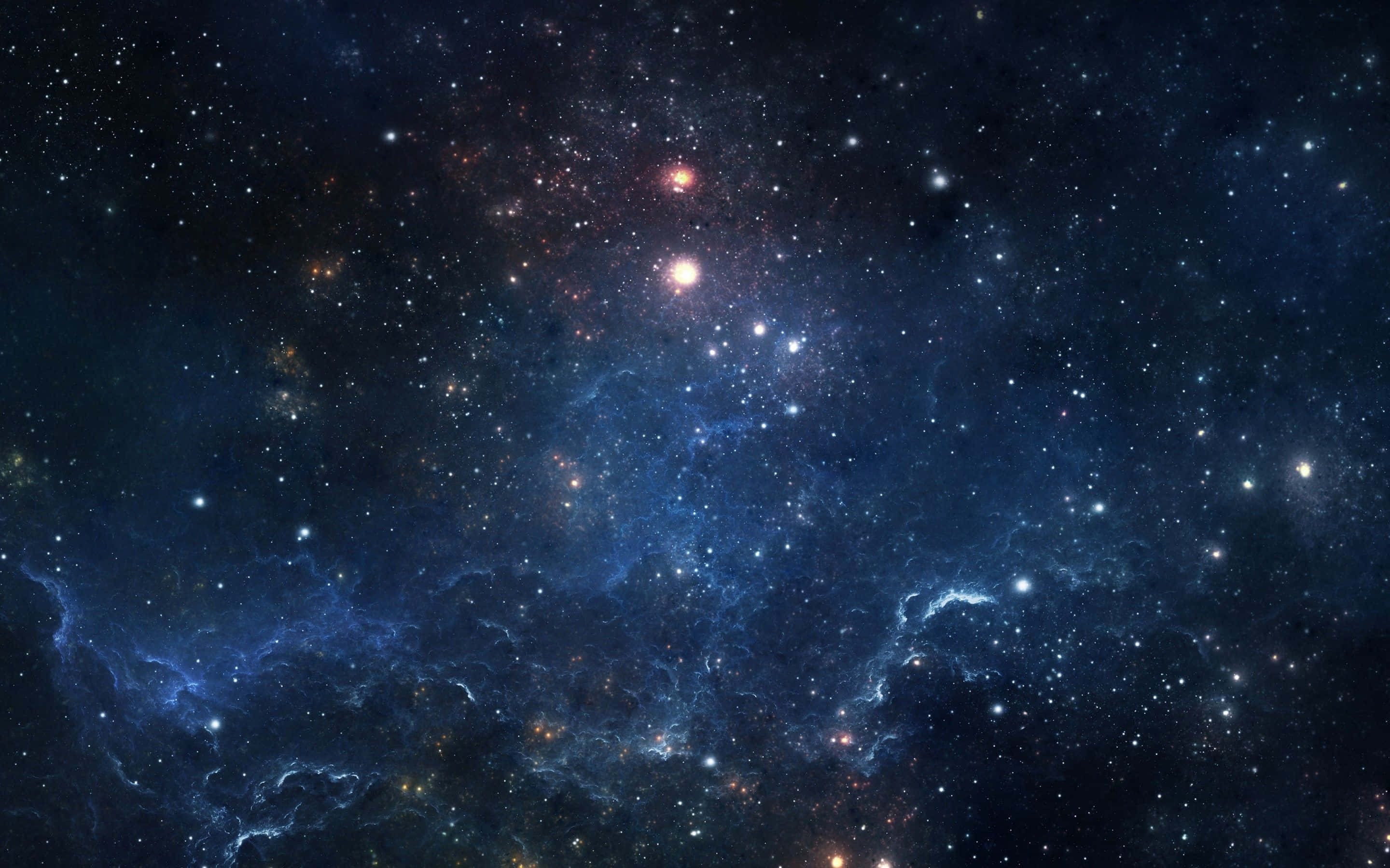 Stars 桌布 壁紙 — 一個令人嘆為觀止的宇宙星雲景象，在星空中散發著藍色和橙色的光芒。