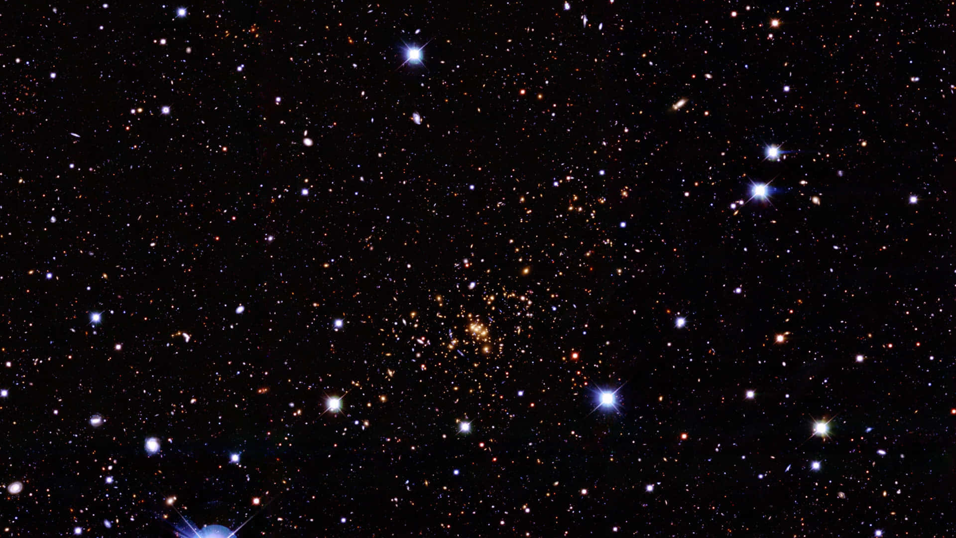 Beautiful Star 桌布 壁紙 — 一個令人嘆為觀止的密集星場景觀，明亮的藍色和橙色星星散落在深邃的黑色宇宙虛空中。