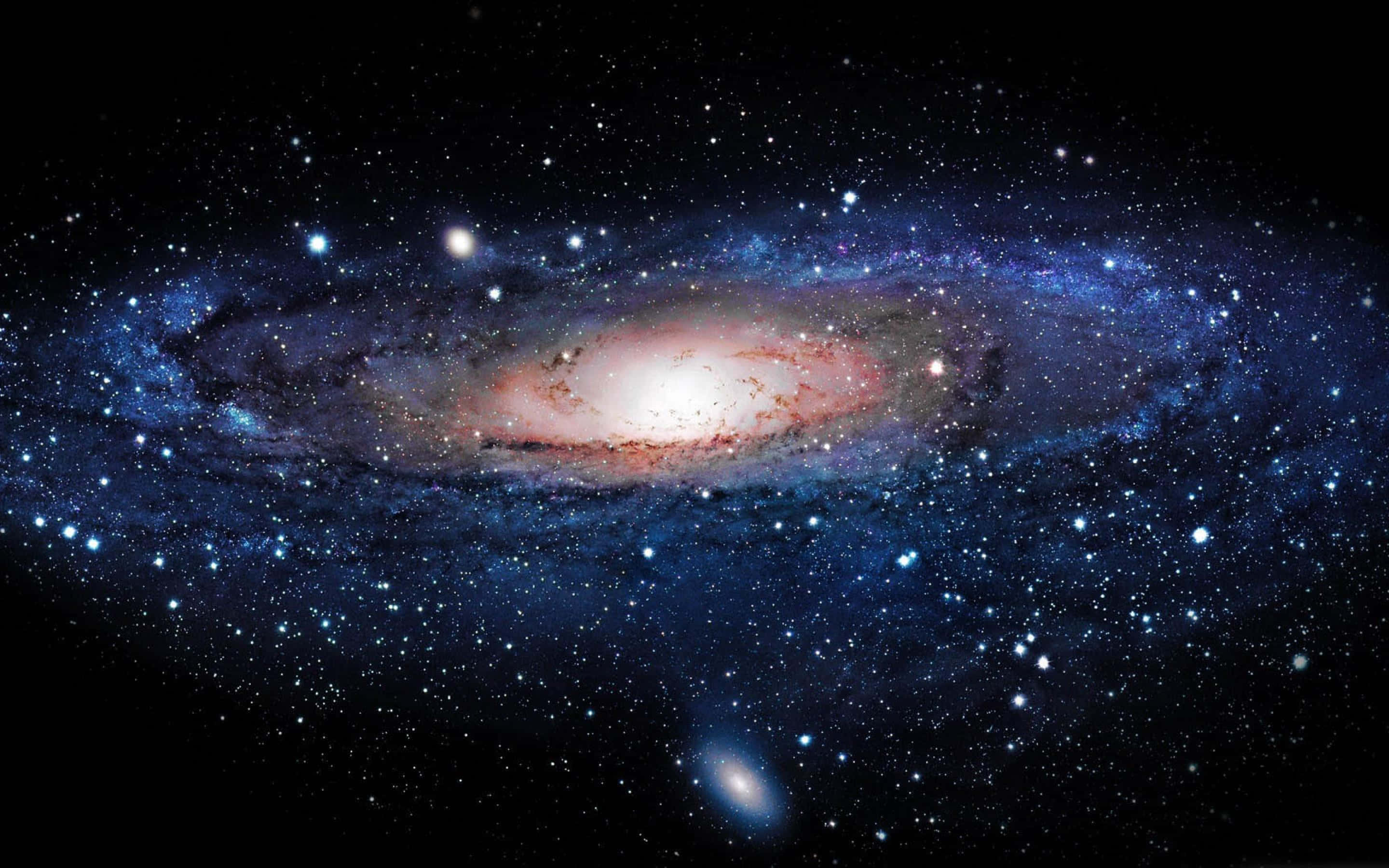 3d Galaxy 桌布 壁紙 — 一個令人嘆為觀止的螺旋星系，在佈滿星辰的宇宙虛空中散發出藍色和紅色的光芒。