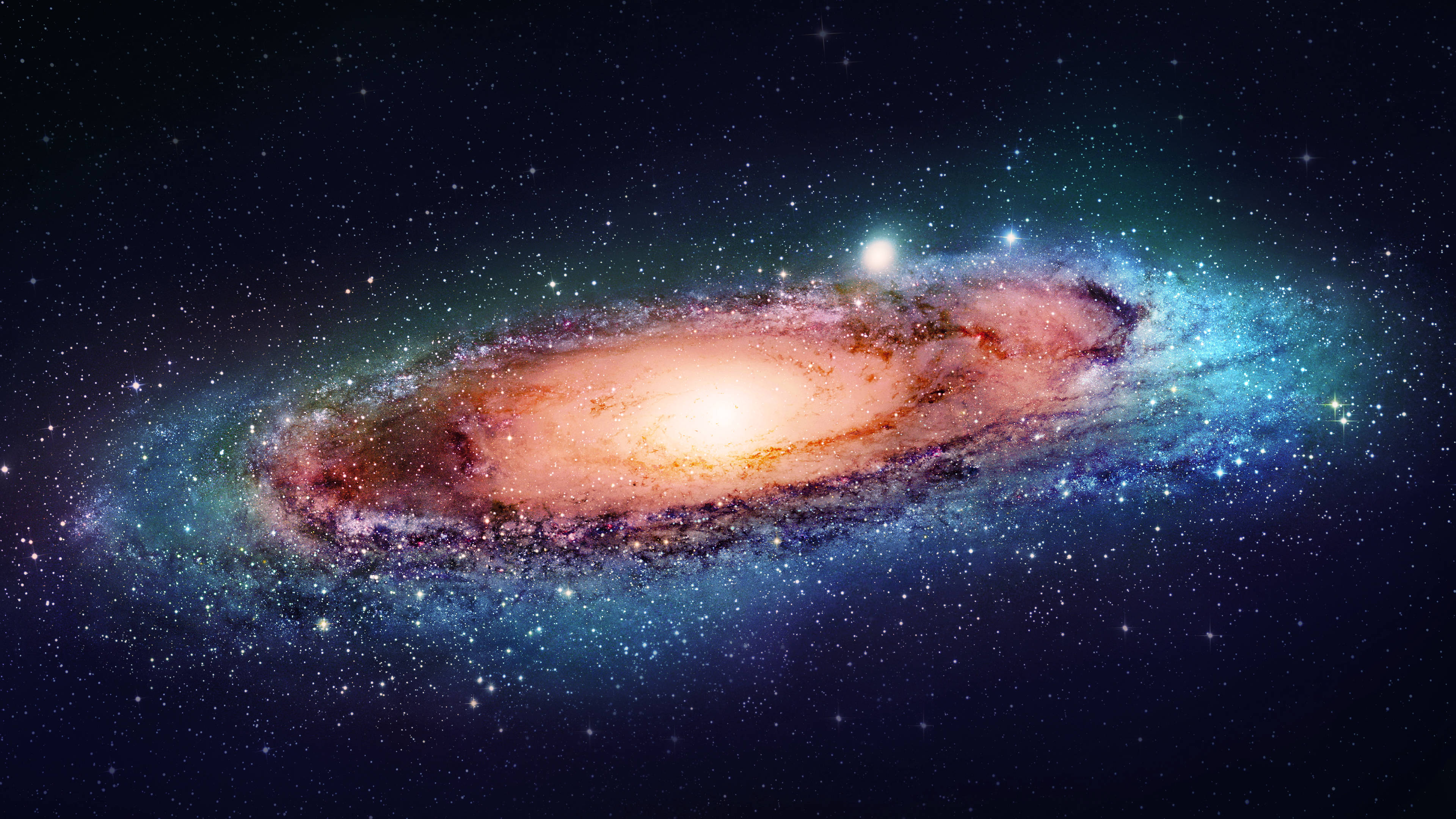 Pretty Galaxy 桌布 壁紙 — 一個令人嘆為觀止的螺旋星系，在星空中散發出橙色和藍色的光芒。