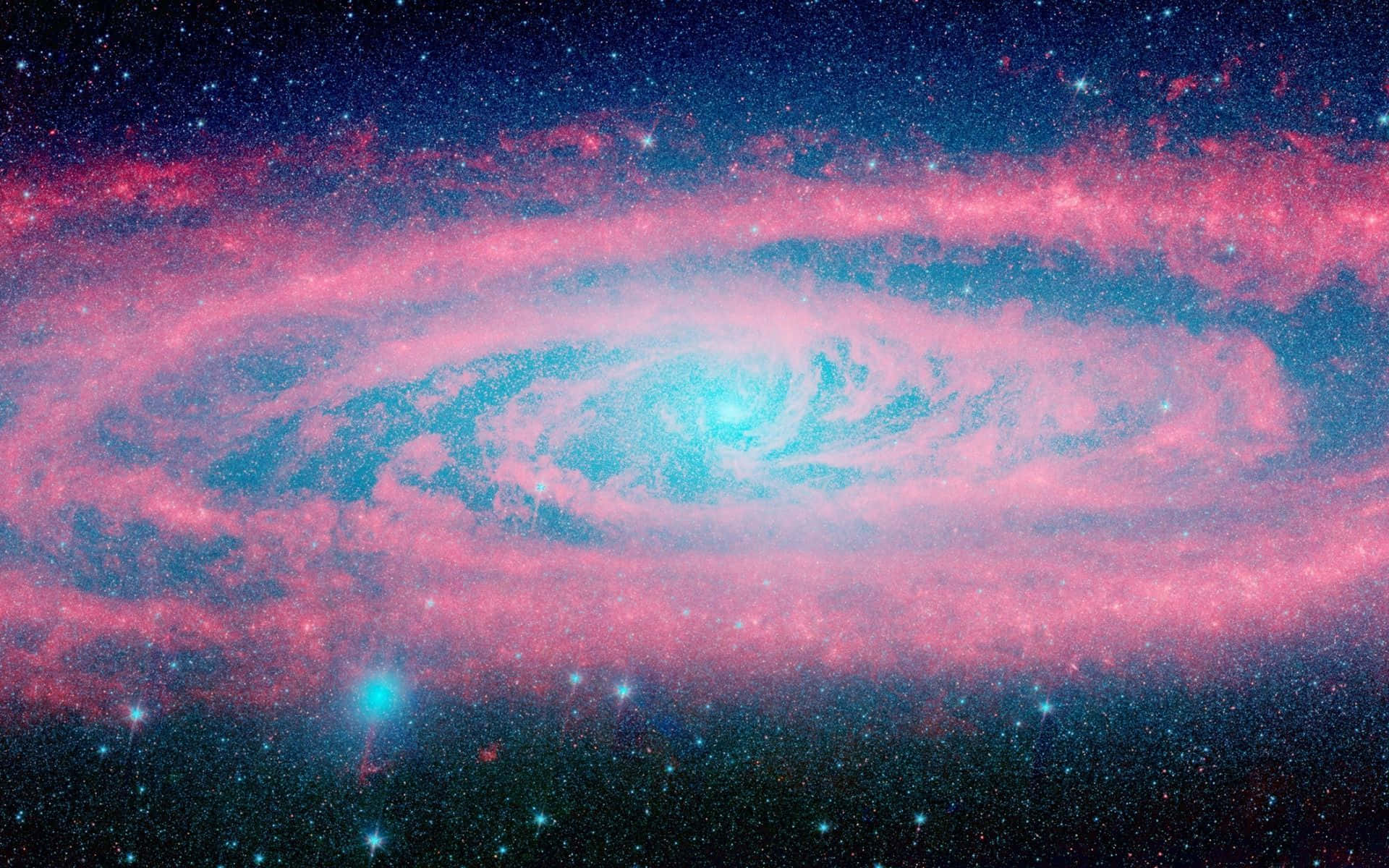 Tumblr Desktop 桌布 壁紙 — 一個令人嘆為觀止的螺旋星系，在繁星點點的宇宙背景下，旋轉著充滿活力的粉紅色和藍綠色星雲。