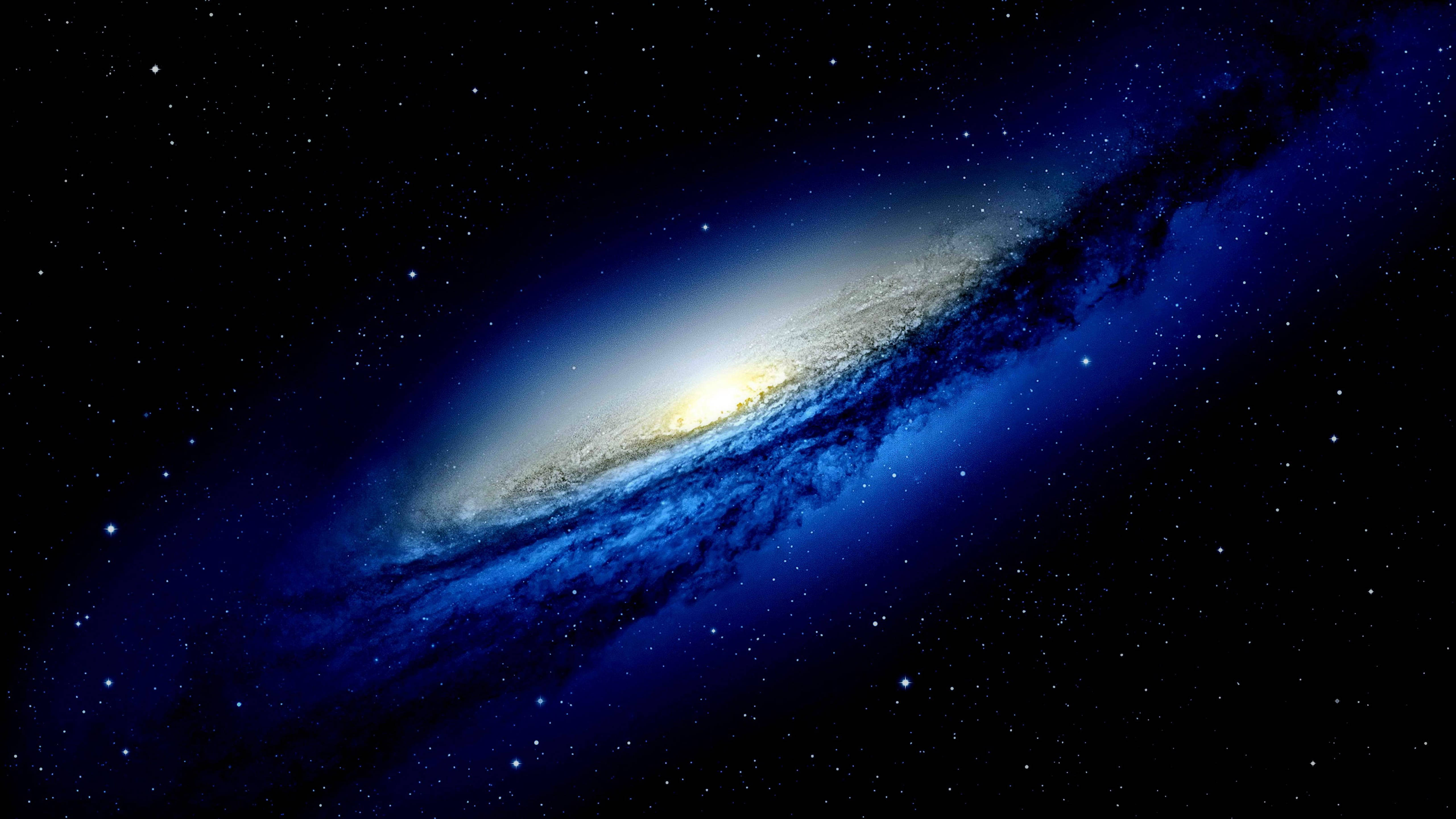 Retina 桌布 壁紙 — 一個令人嘆為觀止的螺旋星系，在繁星點點的宇宙背景下散發出鮮豔的藍色和黃色光芒。