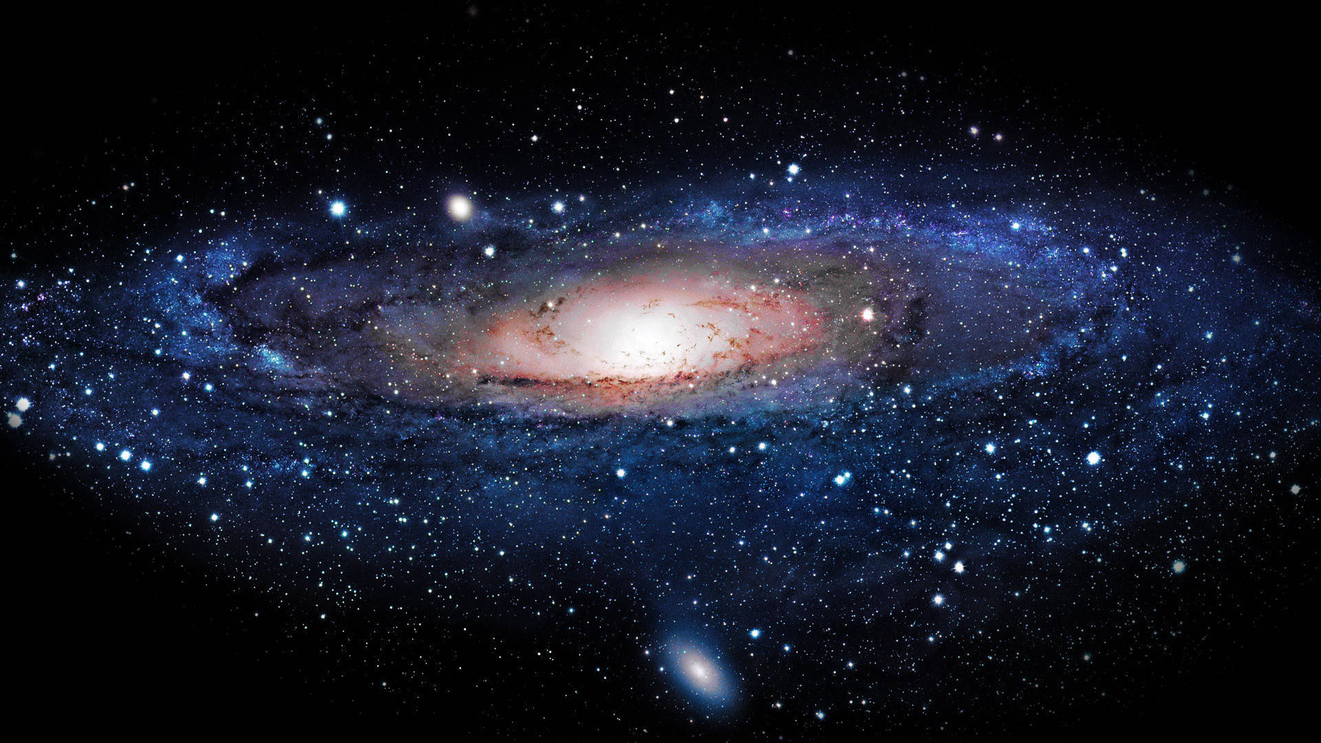 Tumblr 桌面版 桌布 壁紙 — 一個令人嘆為觀止的螺旋星系，在繁星點點的宇宙虛空中閃耀著藍色和橙色的色調。
