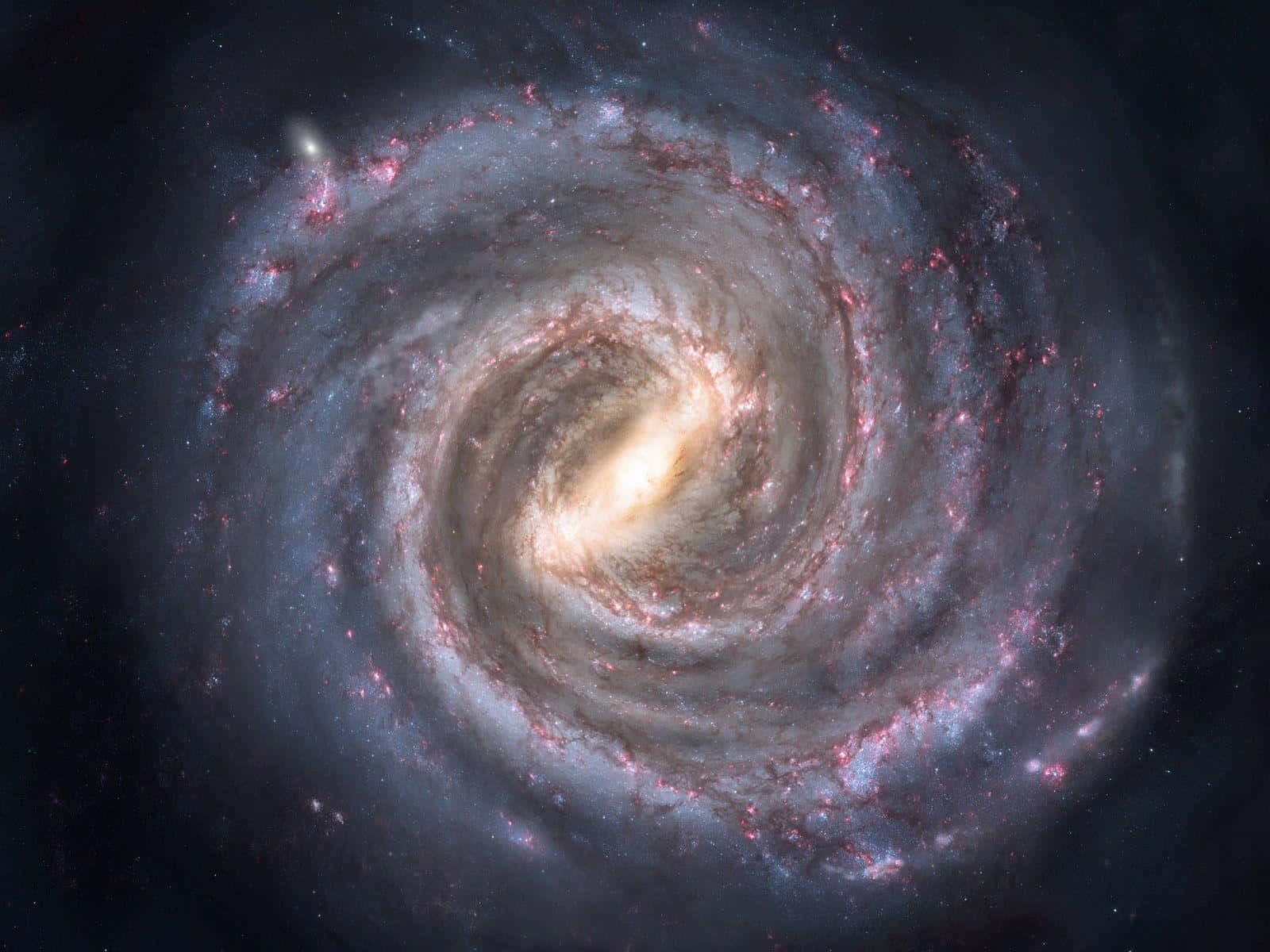 銀河 桌布 壁紙 — 一個令人嘆為觀止的螺旋星系，在繁星點點的宇宙虛空中旋轉，散發著粉紅色和藍色的星雲光芒。