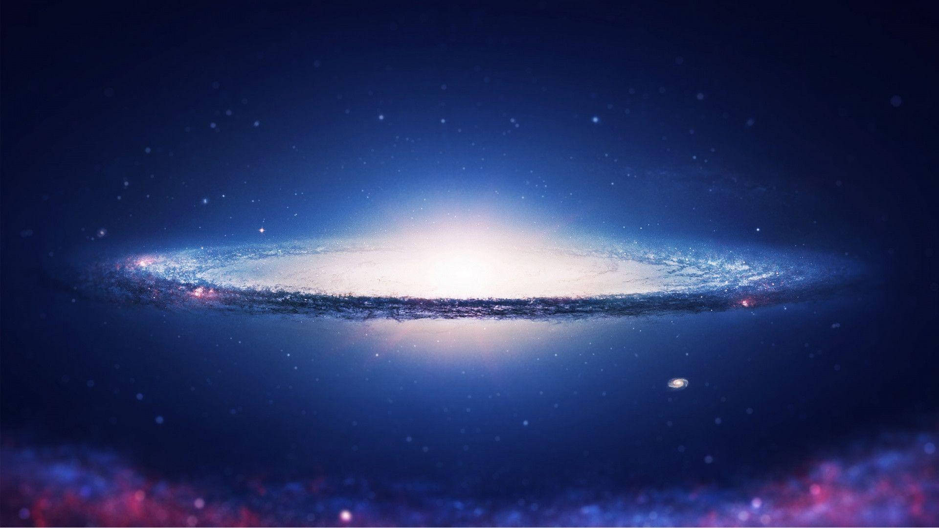 銀河 桌布 壁紙 — 一個令人嘆為觀止的螺旋星系，在黑暗的宇宙背景下發出藍色和白色的光芒。