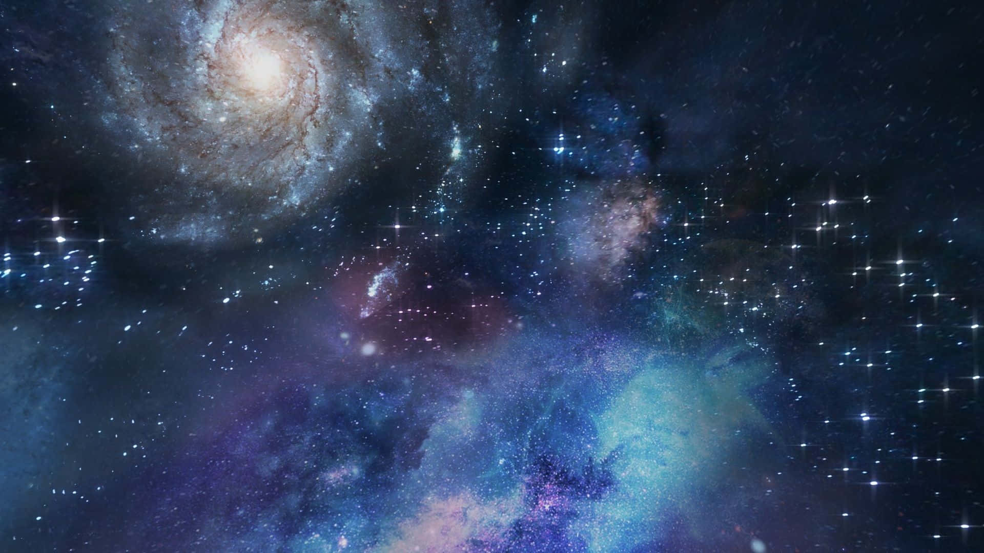 銀河 桌布 壁紙 — 一個令人嘆為觀止的螺旋星系景觀，在深藍色和紫色的星雲背景下，旋轉著宇宙塵埃和發光的恆星。
