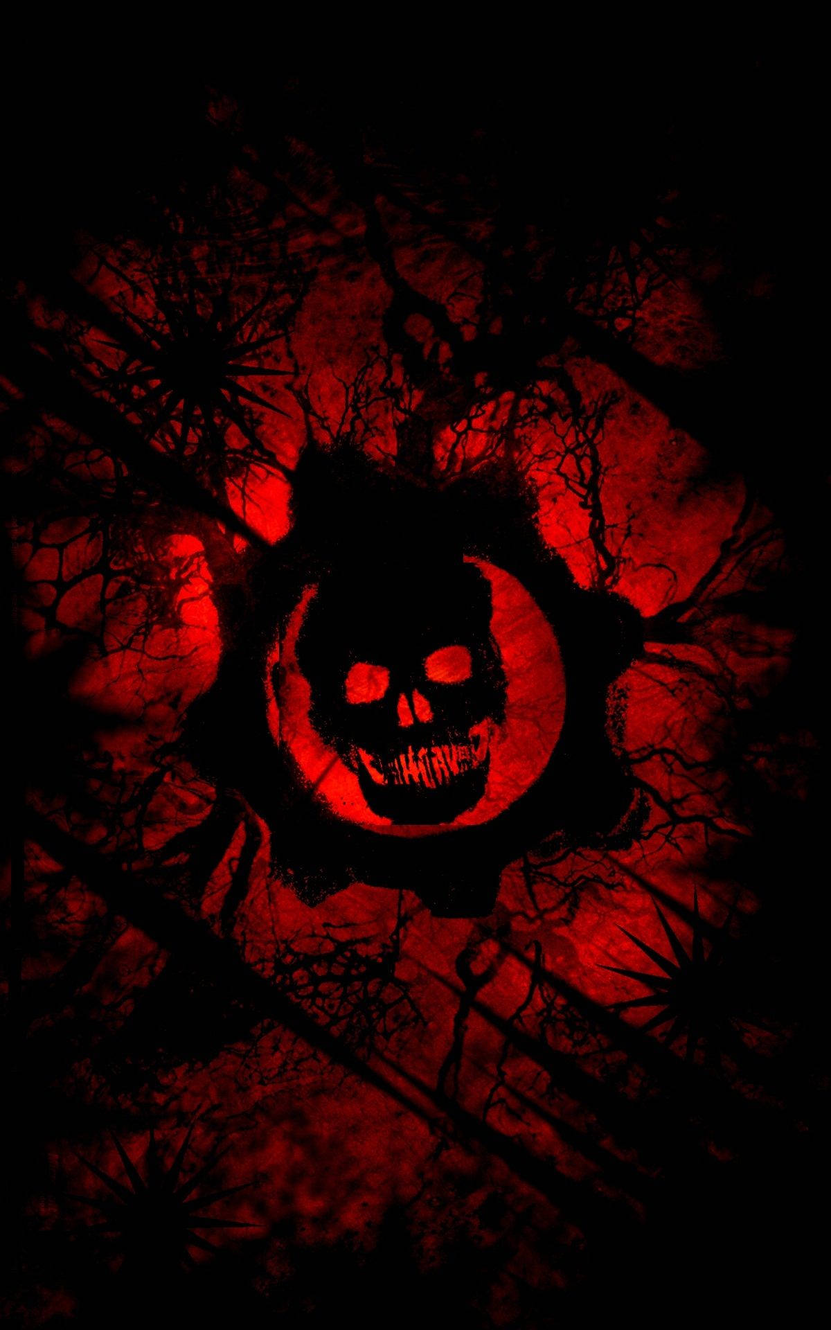 Gaming Logos 桌布 壁紙 — 一個令人畏懼的骷髏頭在齒輪內發光，背景是血紅色，帶有黑暗扭曲的樹枝。