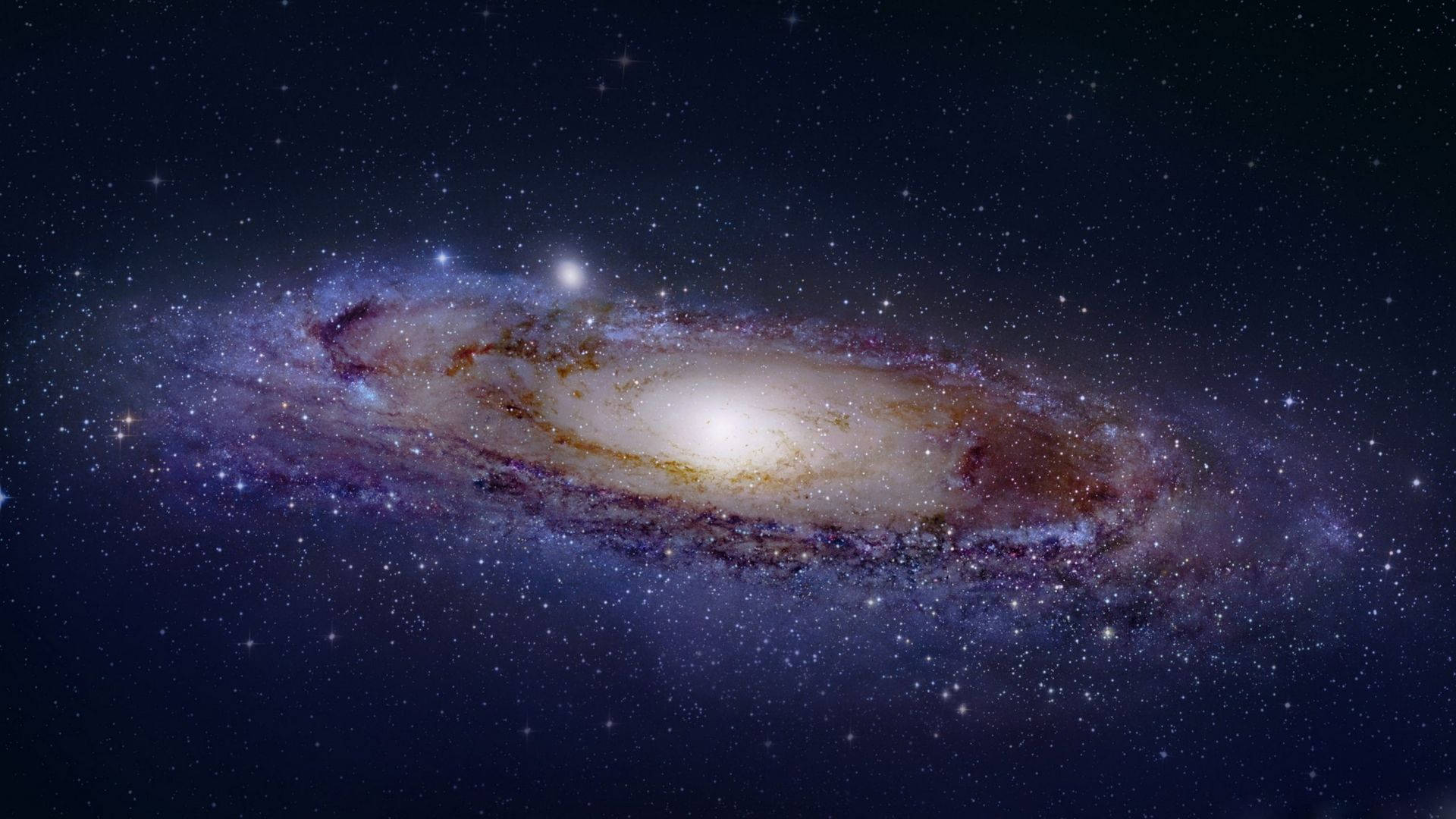 銀河 桌布 壁紙 — 一個令人驚嘆的螺旋星系，在繁星點點的宇宙背景下散發出金色和紫色的光芒。