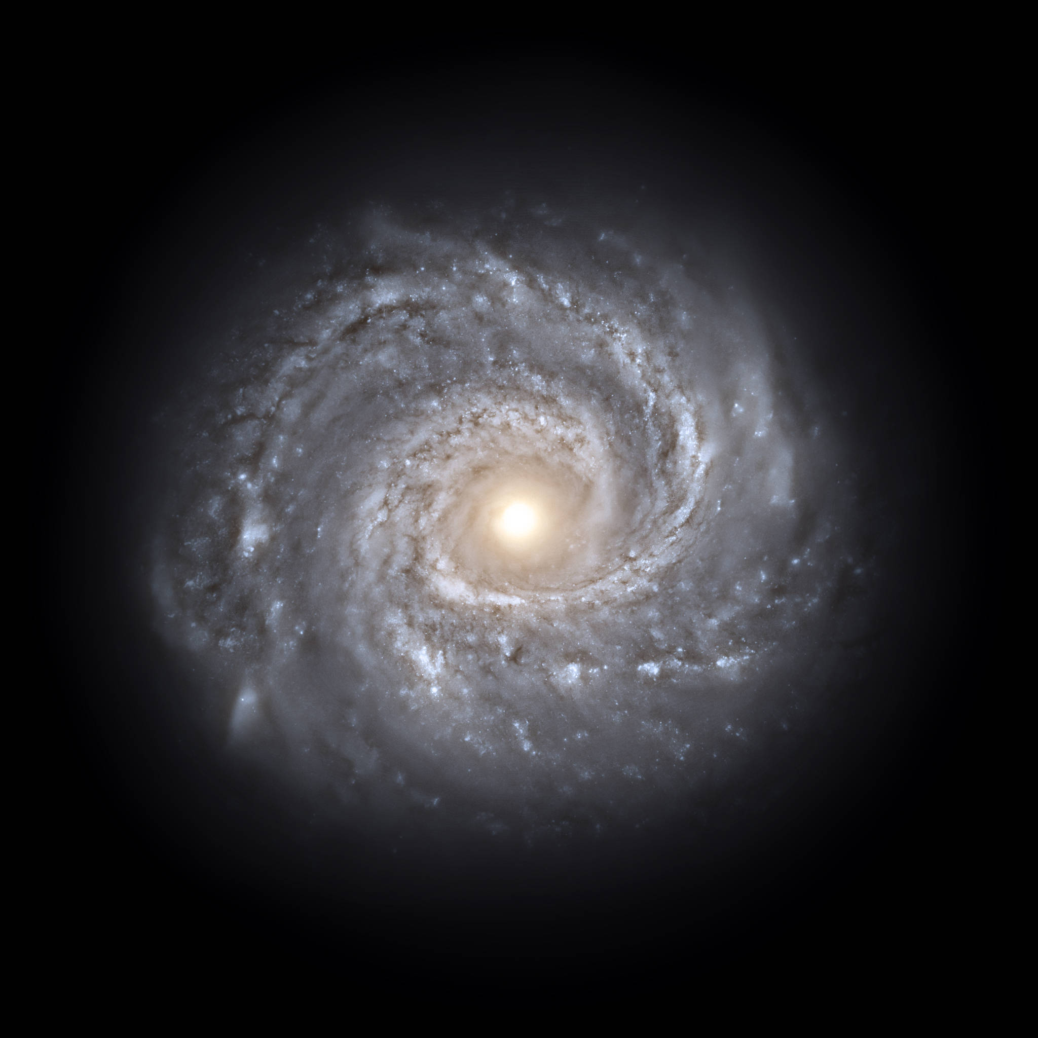 Stars 桌布 壁紙 — 一個令人驚嘆的螺旋星系，擁有明亮的中心核心和由恆星和塵埃組成的旋轉臂，背景是深邃的黑色太空。