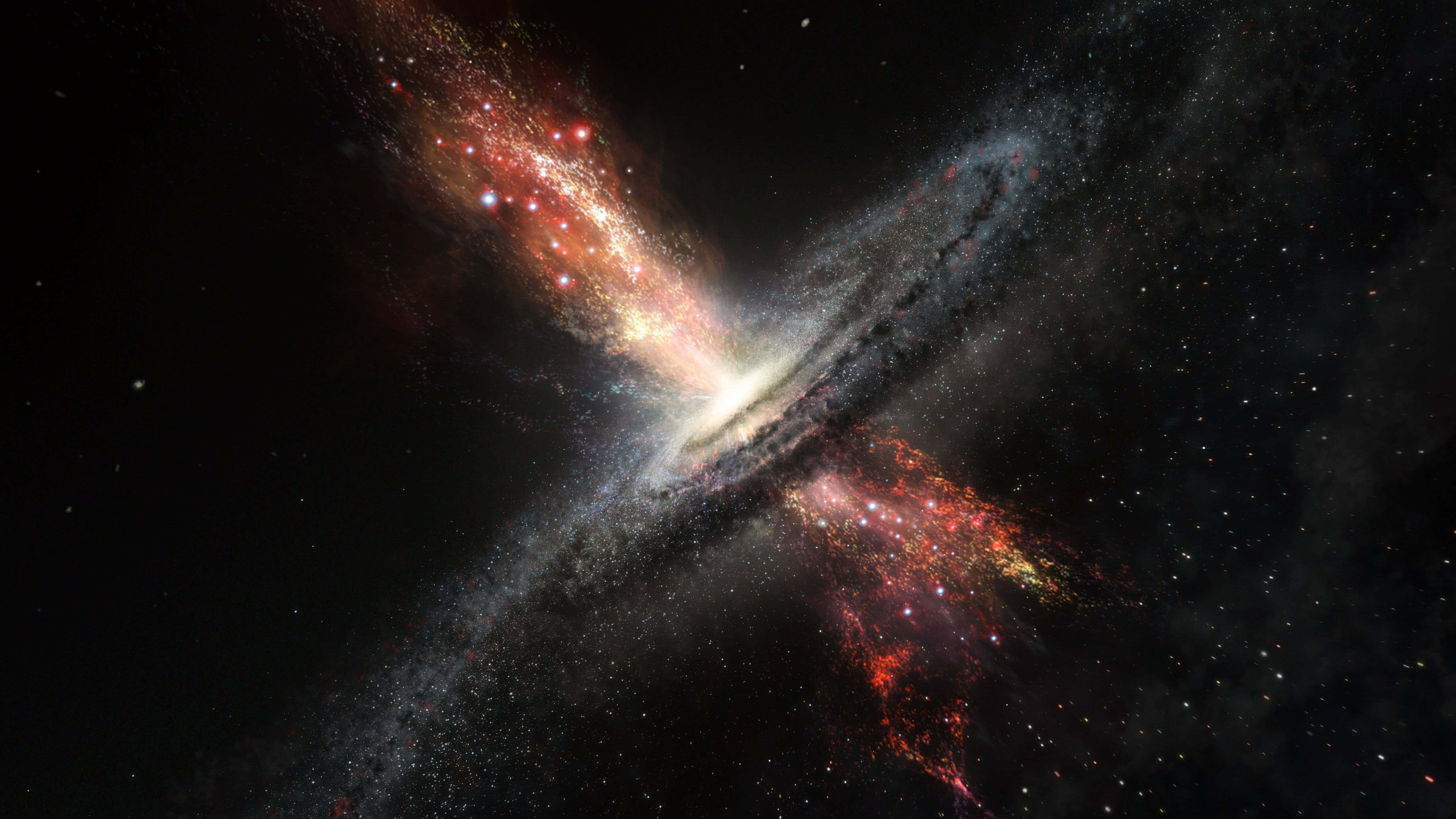 Trippy Galaxy 桌布 壁紙 — 一個令人驚嘆的螺旋星系與熾熱的紅色和橙色星雲在繁星點點的宇宙虛空中碰撞。