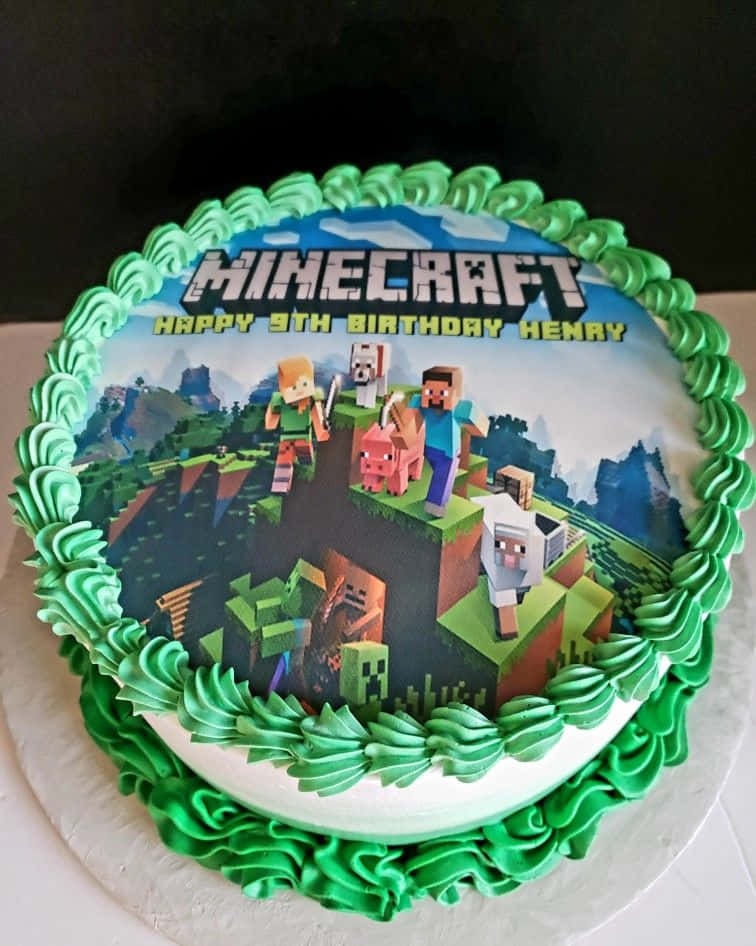 Minecraft Cakes 桌布 壁紙 — 一個以Minecraft為主題的生日蛋糕，帶有綠色糖霜邊框和印刷圖像上的角色，慶祝Henry的9歲生日。