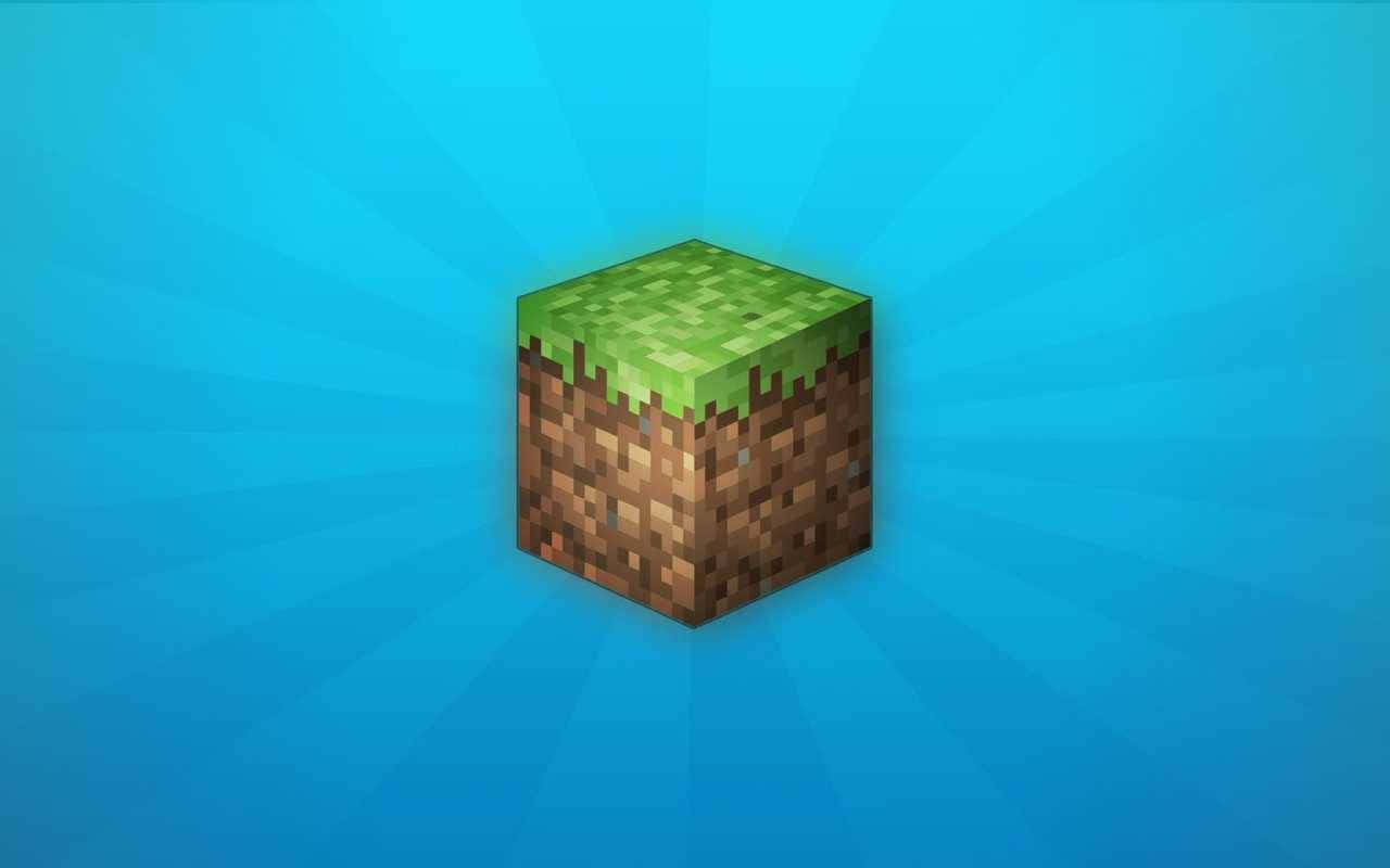 桌布 壁紙 — 一個來自Minecraft的像素化草地方塊漂浮在耀眼的藍色漸變背景上。