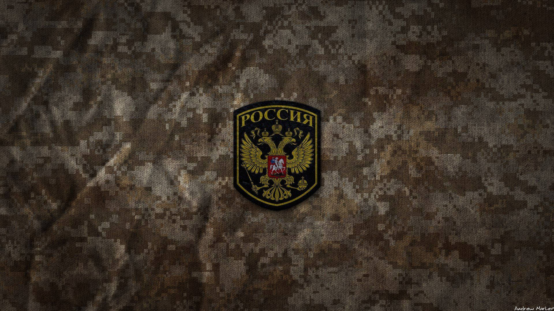 Russia 桌布 壁紙 — 一個俄羅斯軍用臂章，雙頭鷹標誌居中於有紋理的數位迷彩布料上。