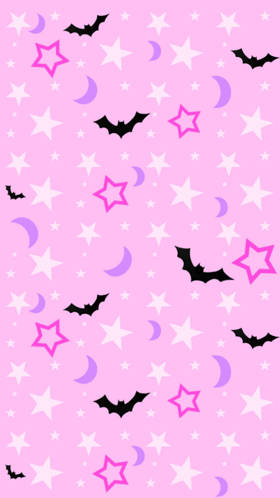 Pastel Halloween 桌布 壁紙 — 一個俏皮的粉紅色壁紙圖案，黑色蝙蝠、白色星星和紫色新月散落在粉彩粉紅背景上。