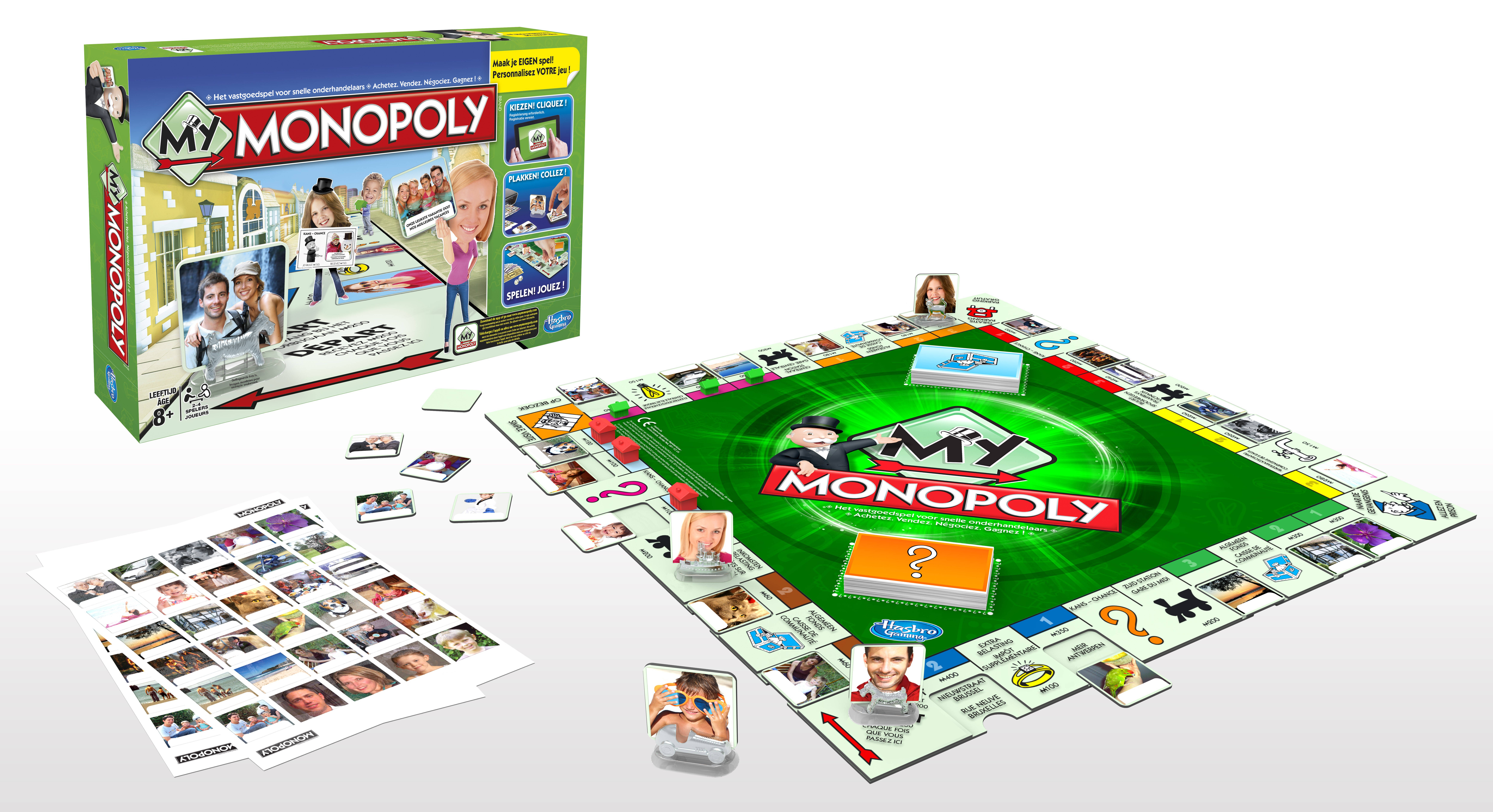 Monopoly 桌布 壁紙 — 一個個人化的My Monopoly棋盤遊戲，卡片和棋子印有自訂的家庭照片，擺放在乾淨的白色表面上。