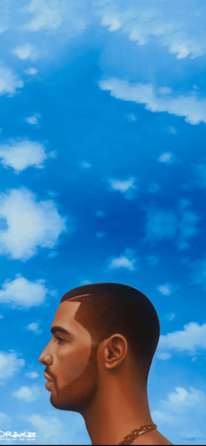 Aesthetic Drake 桌布 壁紙 — 一個側面的男人抬頭望向一片佈滿 fluffy 白色雲朵的廣闊藍天。