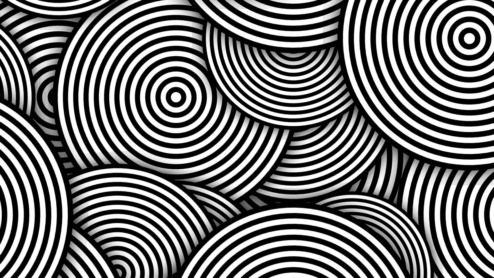 Minimalist Black And White 桌布 壁紙 — 一個催眠般的黑白壁紙，重疊的同心圓創造出動態的視錯覺。