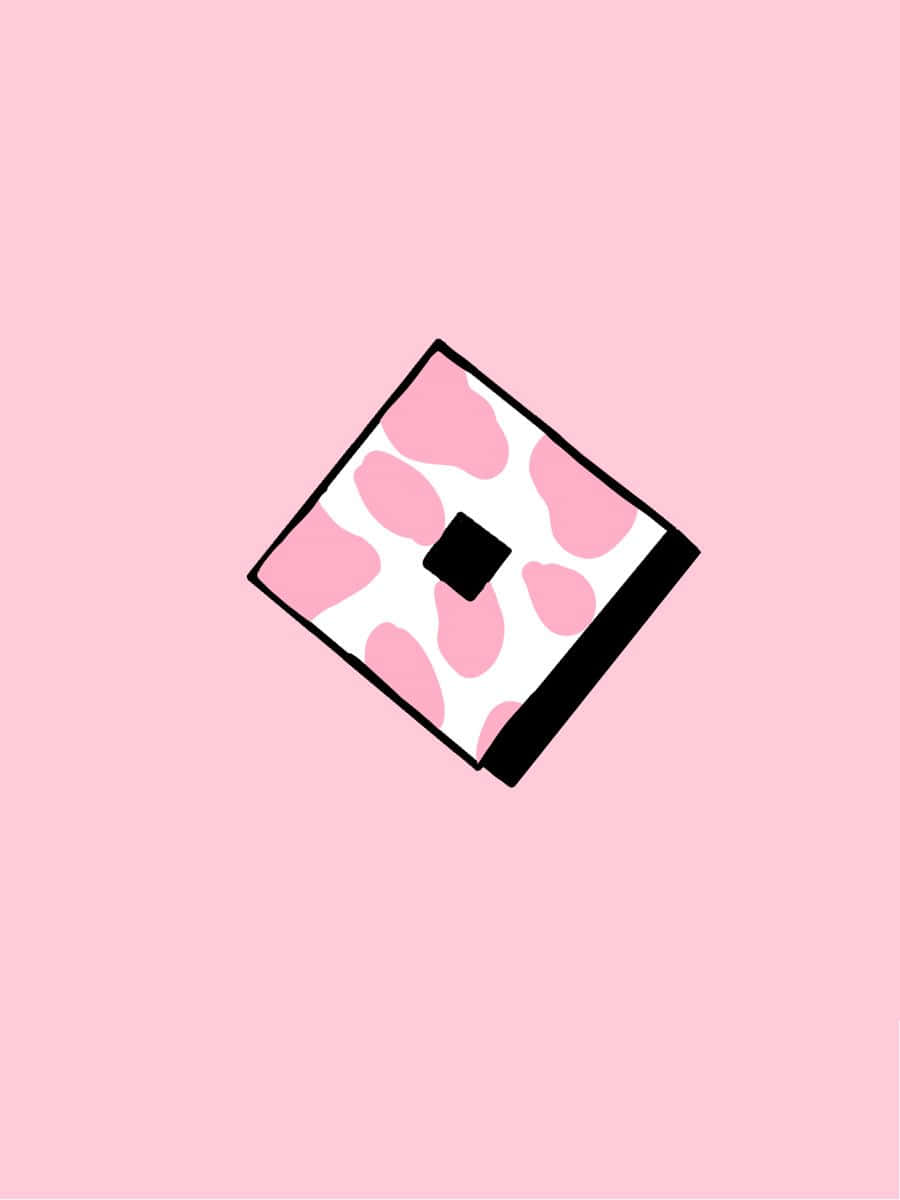 Roblox Pink 桌布 壁紙 — 一個傾斜的正方形，帶有粉紅色乳牛印花圖案和黑色邊框，漂浮在純色粉彩粉紅色背景上。
