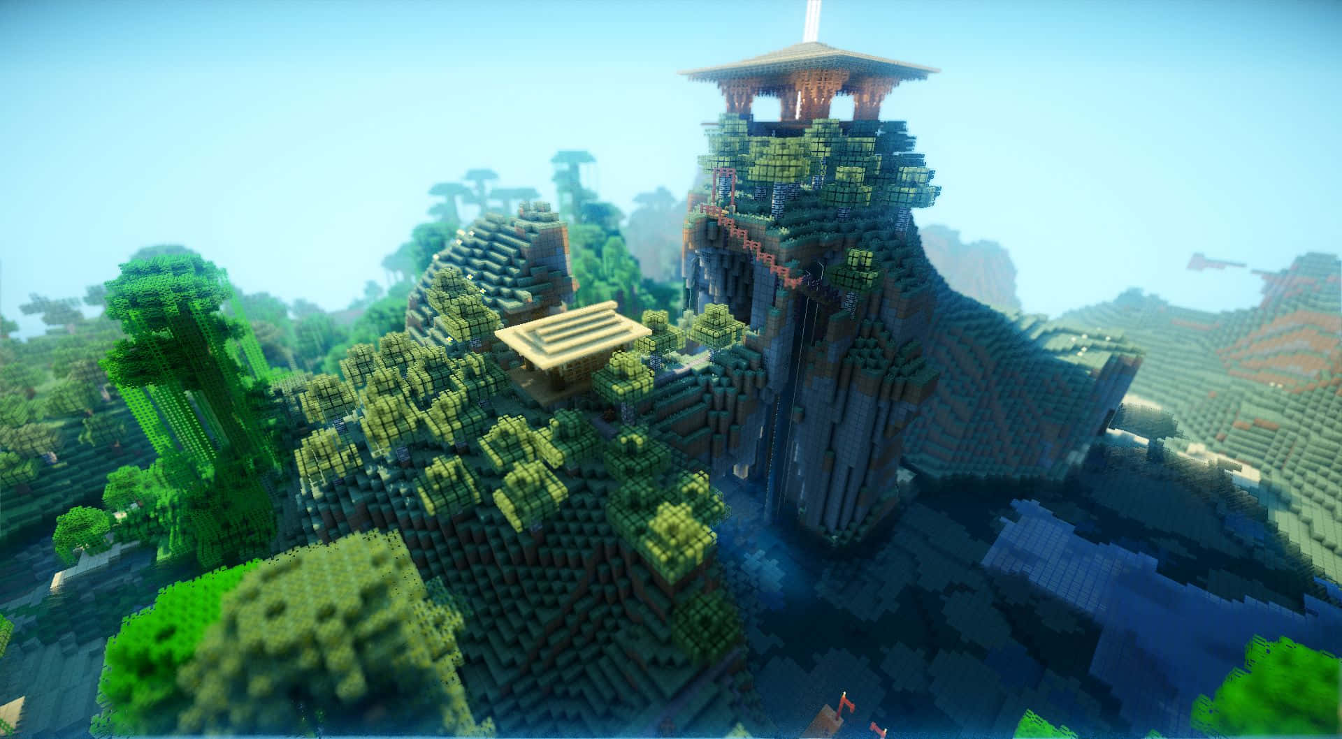 Minecraft Shaders 桌布 壁紙 — 一個像素化的Minecraft山頂堡壘，有茂密的綠色樹木和一個木塔，在清澈的藍天下。