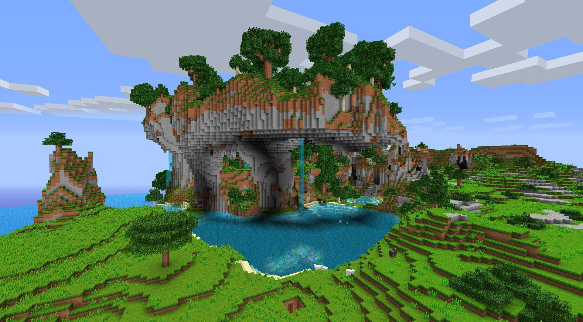 Blue Sky 桌布 壁紙 — 一個像素化的Minecraft景觀， featuring 一座高聳的懸崖，瀑布傾瀉而下，流入一個被綠色草丘和樹木環繞的藍色水池，天空多雲。