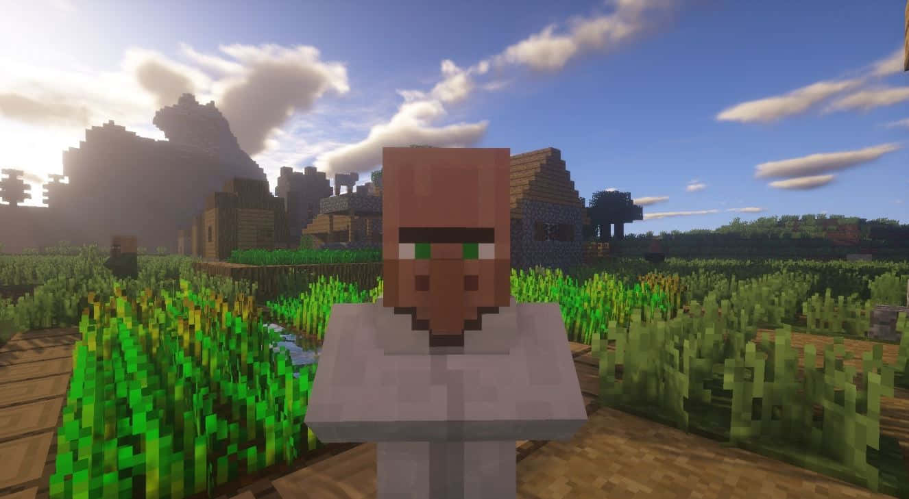 Minecraft Villagers 桌布 壁紙 — 一個像素化的Minecraft角色站在草地上，周圍有木柵欄和遠處的方塊房屋，上方是明亮的藍天和蓬鬆的雲朵。