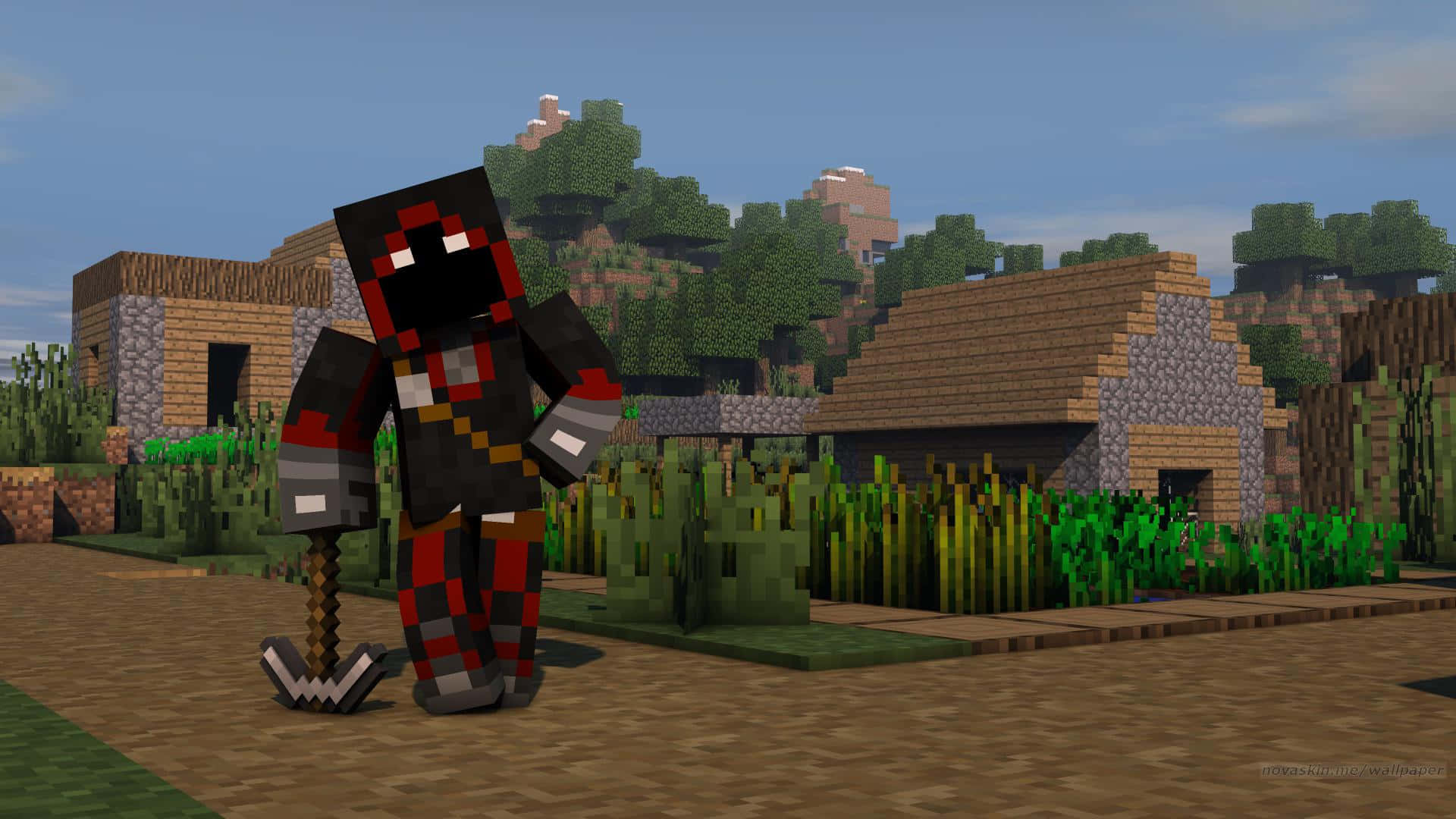 桌布 壁紙 — 一個像素化的Minecraft角色穿著紅黑盔甲，站在一個有方塊房屋和綠植的村莊裡，頭頂是清澈的藍天。