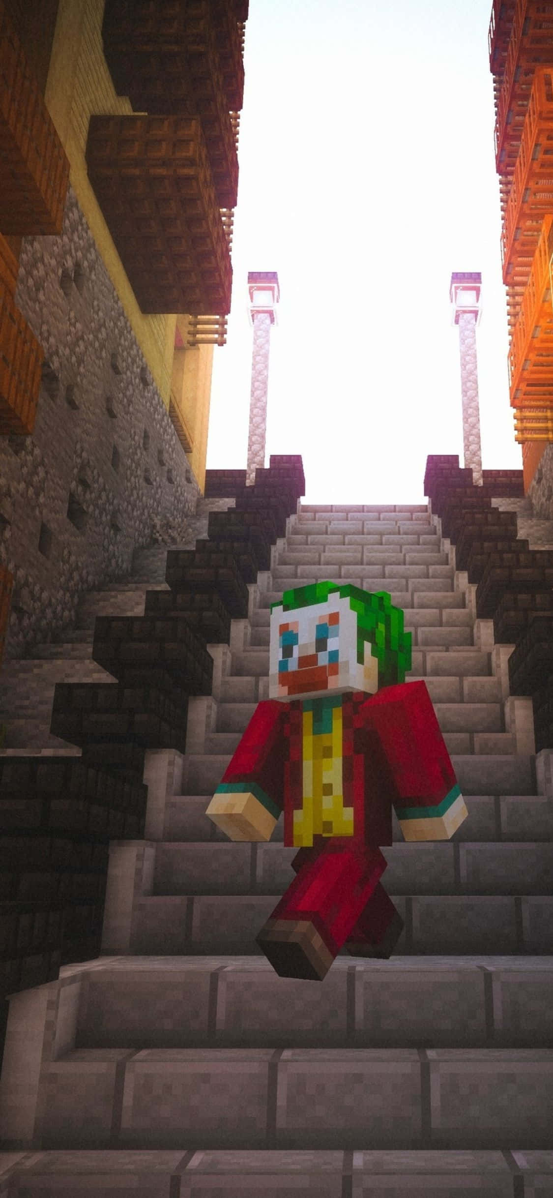 iPhone Xs Minecraft 桌布 壁紙 — 一個像素化的小丑角色，紅綠配色，站在Minecraft風格堡壘的石樓梯頂端，陽光普照。