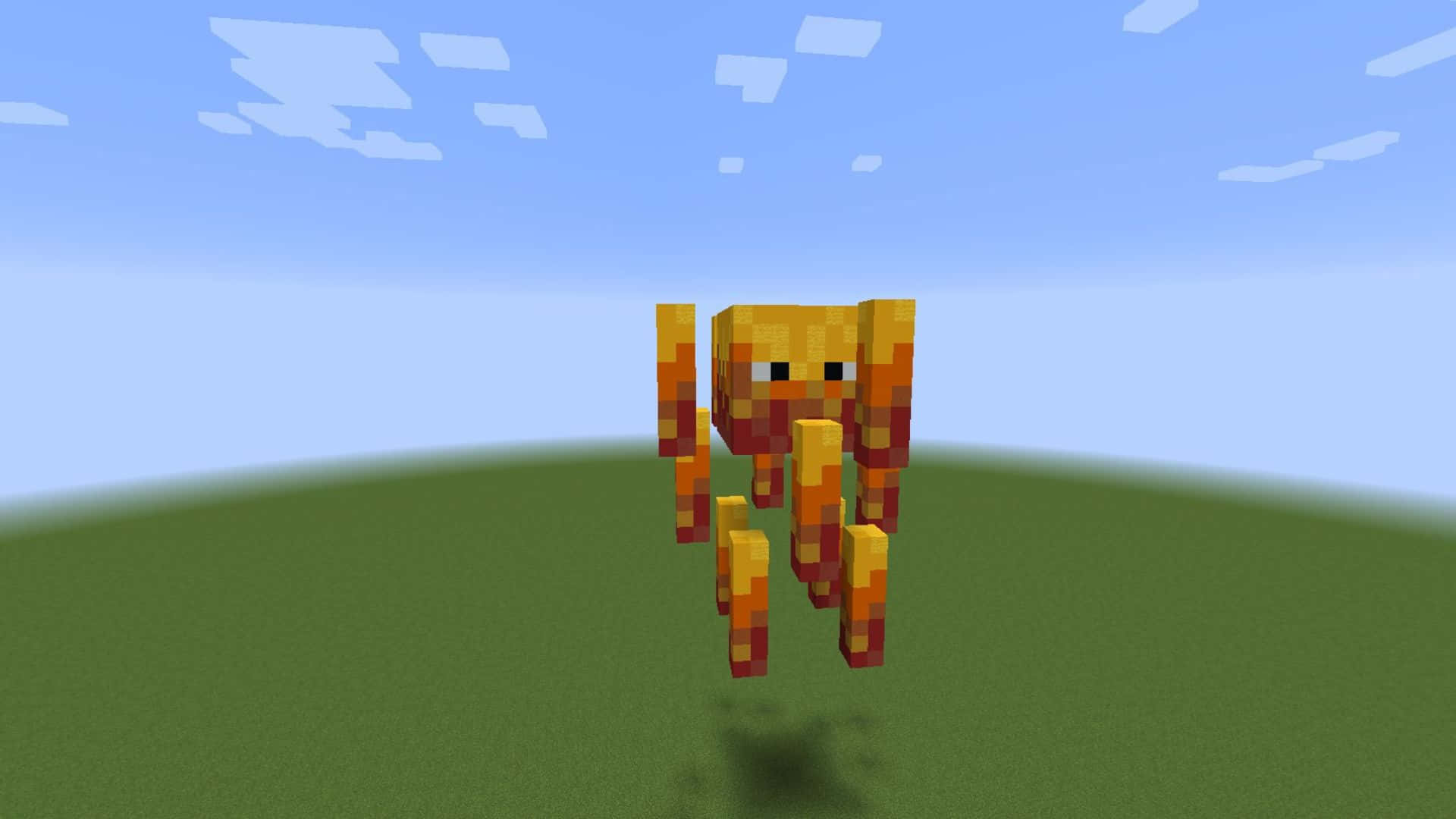 Minecraft Blaze 桌布 壁紙 — 一個像素化的橙色和黃色爬行者站在綠色山丘上，藍天下有方塊狀的雲。