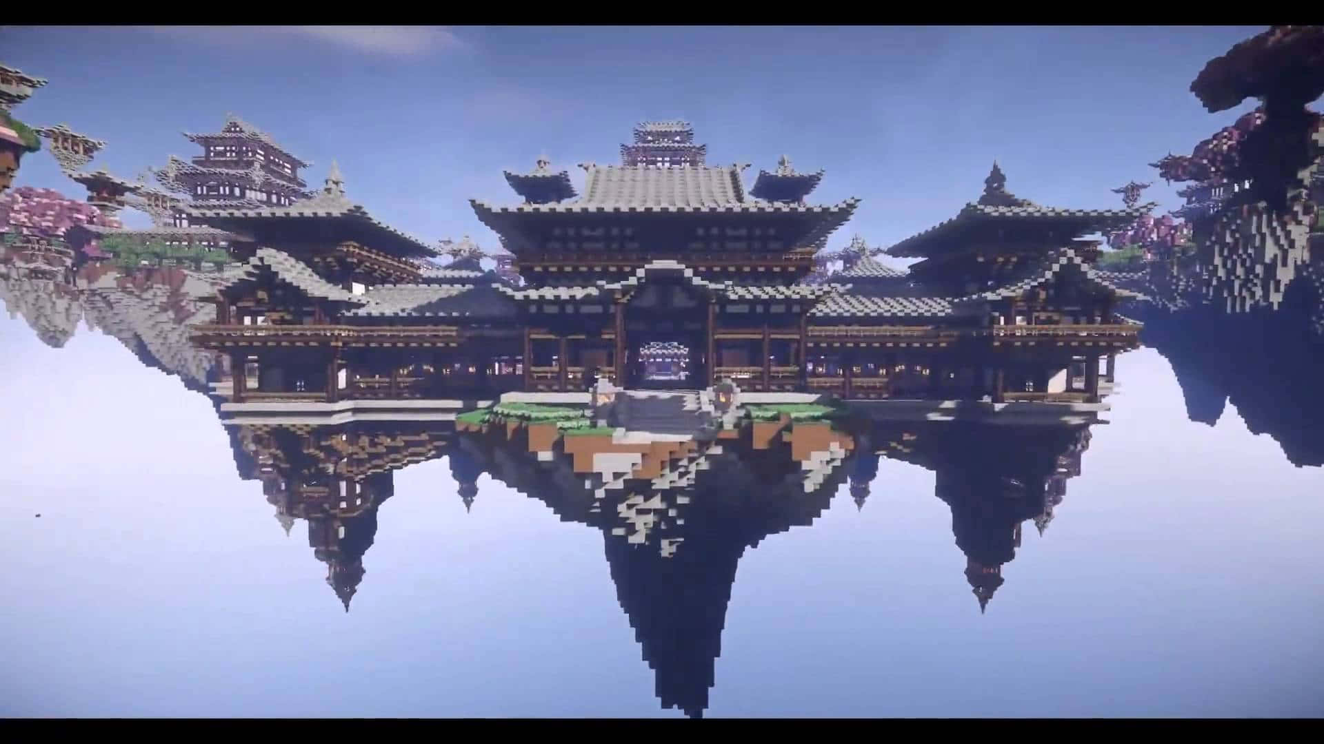 最佳我的世界 桌布 壁紙 — 一個像素化的漂浮中國寺廟建築群在清澈藍天下完美倒映在平靜的水面上。
