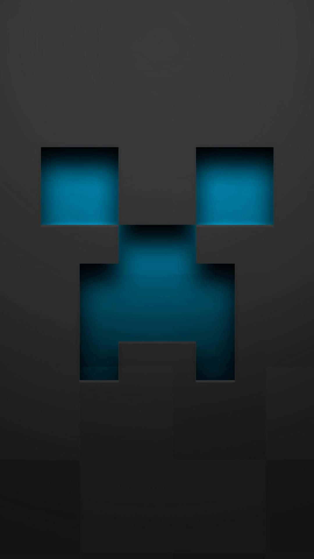 Minecraft Characters 桌布 壁紙 — 一個像素化的爬行者面孔，帶有發光的藍色眼睛和嘴巴，背景為深灰色。