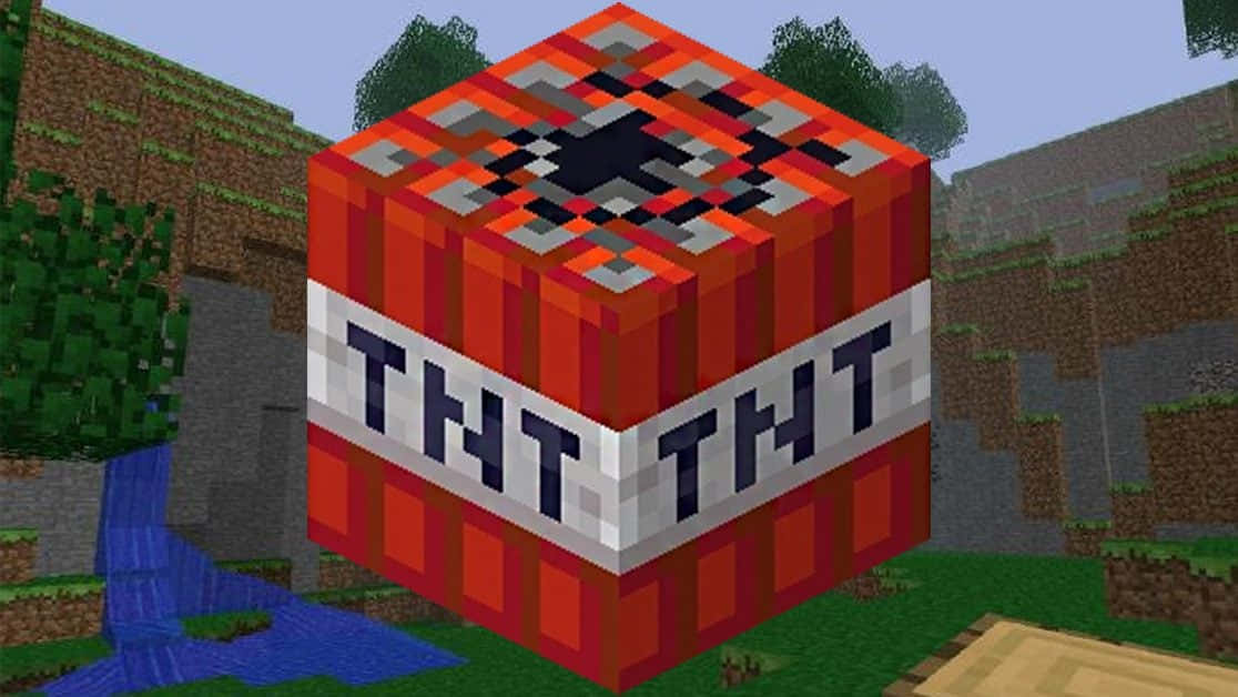 我的世界 TNT 桌布 壁紙 — 一個像素化的紅色TNT方塊，帶有黑色引線，位於Minecraft景觀中，靠近河流和樹木。