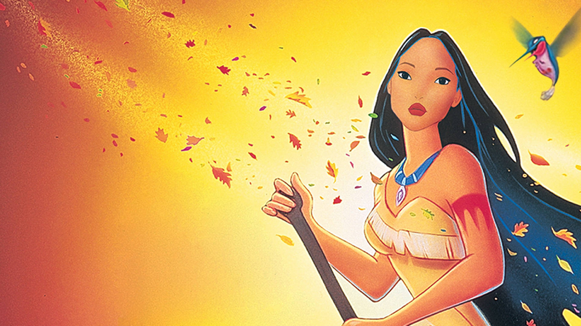 Pocahontas 桌布 壁紙 — 一個充滿活力的動畫女孩，長長的黑髮，將秋天的樹葉吹向金色的日落天空，附近有一隻蜂鳥飛過。