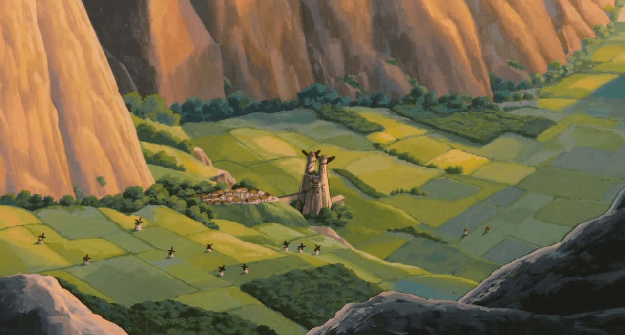 nausicaä of the valley of the wind 桌布 壁紙 — 一個充滿活力的動畫山谷，在明亮的陽光下，高聳的橙色懸崖之間有梯田式的綠色田野。