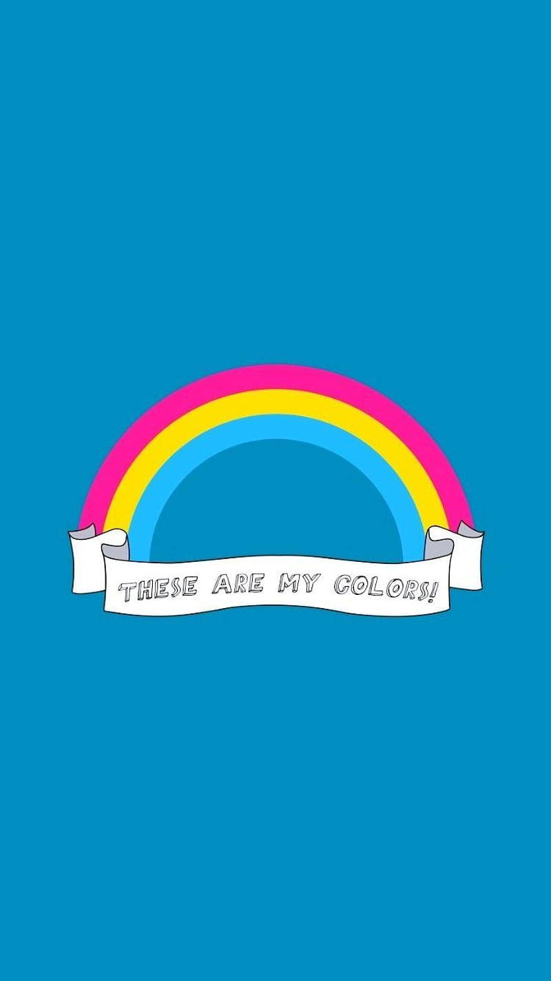 Pansexual 桌布 壁紙 — 一個充滿活力的卡通彩虹，帶有粉紅色、黃色和藍色的弧線，位於一個白色橫幅上方，橫幅上寫著THESE ARE MY COLORS!，背景為純青色。
