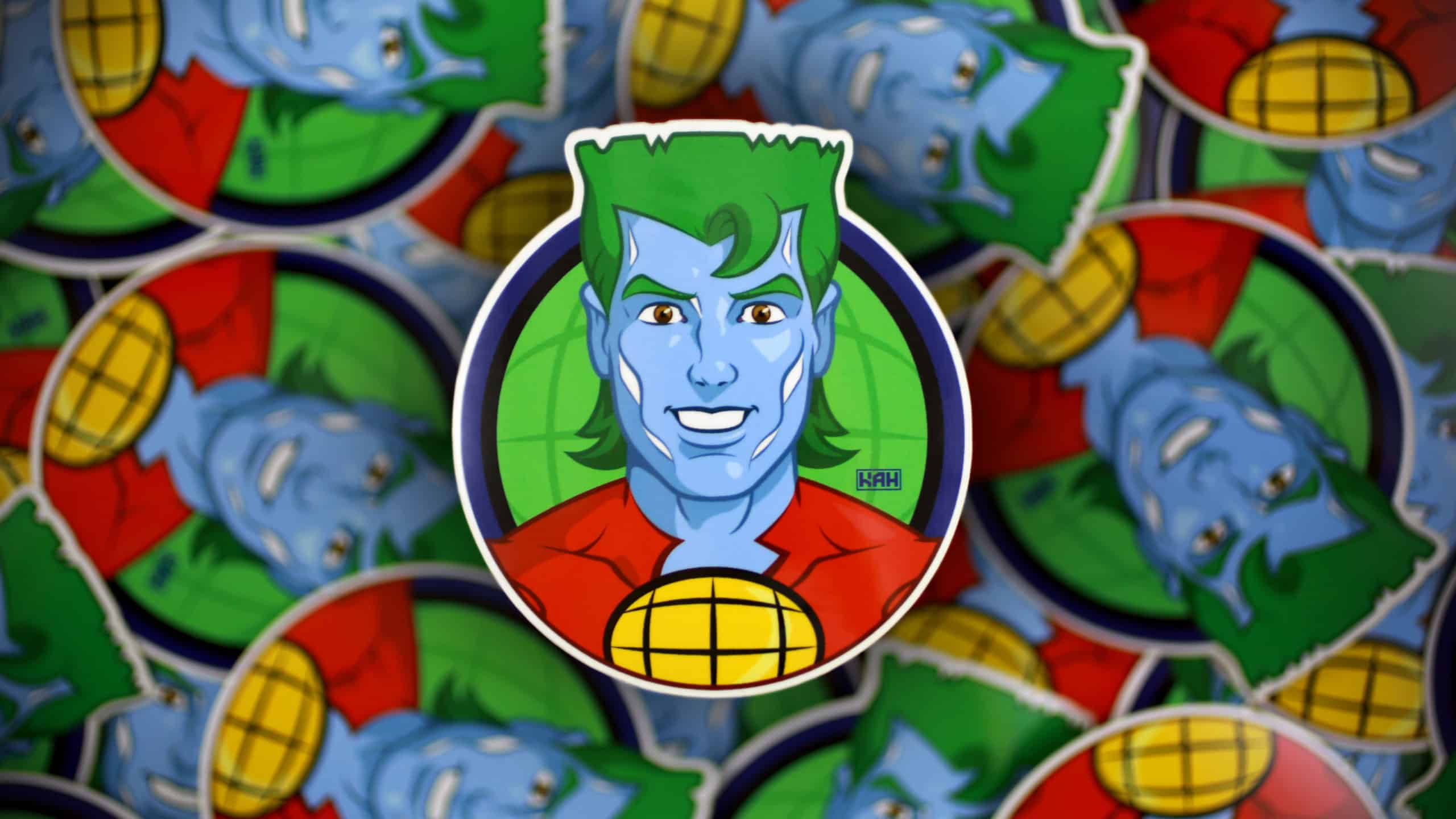 Captain Planet 桌布 壁紙 — 一個充滿活力的卡通貼紙，上面有一個藍皮膚、綠頭髮、紅衫的男人，被相同貼紙包圍，形成色彩繽紛的圖案。
