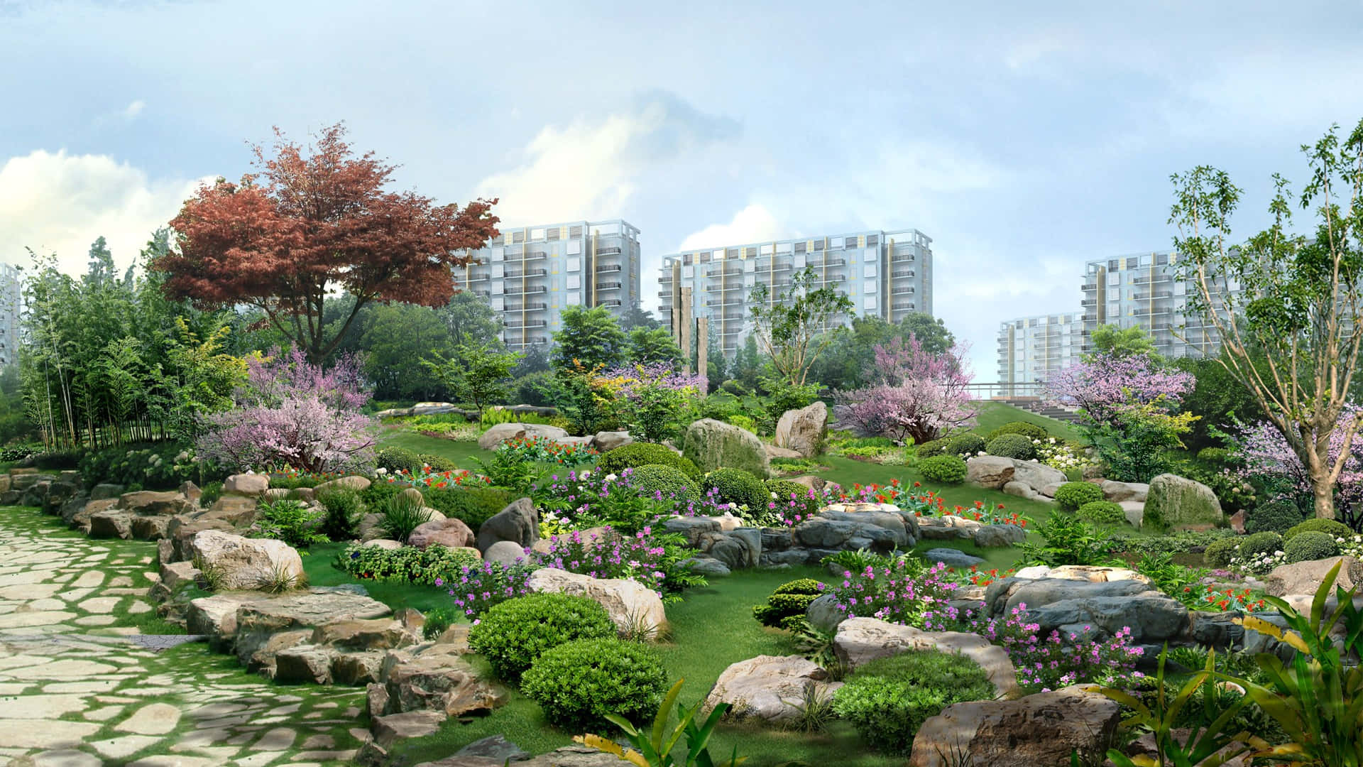 Japan Landscape 桌布 壁紙 — 一個充滿活力的園林花園，盛開的花朵和蜿蜒的石徑，以現代公寓大樓為背景，天空明亮。