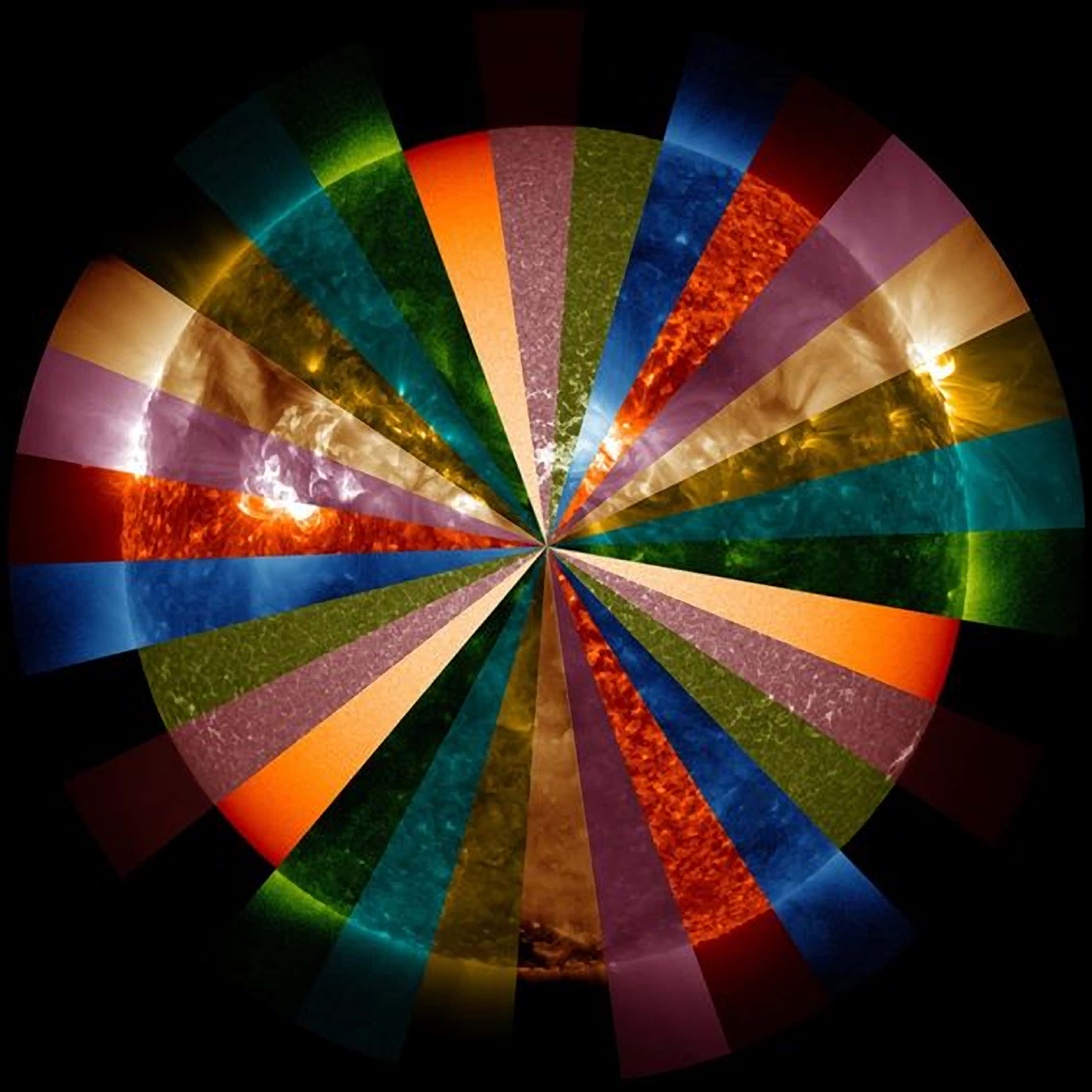 Color Palette 桌布 壁紙 — 一個充滿活力的多彩太陽耀斑從熾熱的太陽中放射出來，在黑色虛空中綻放。