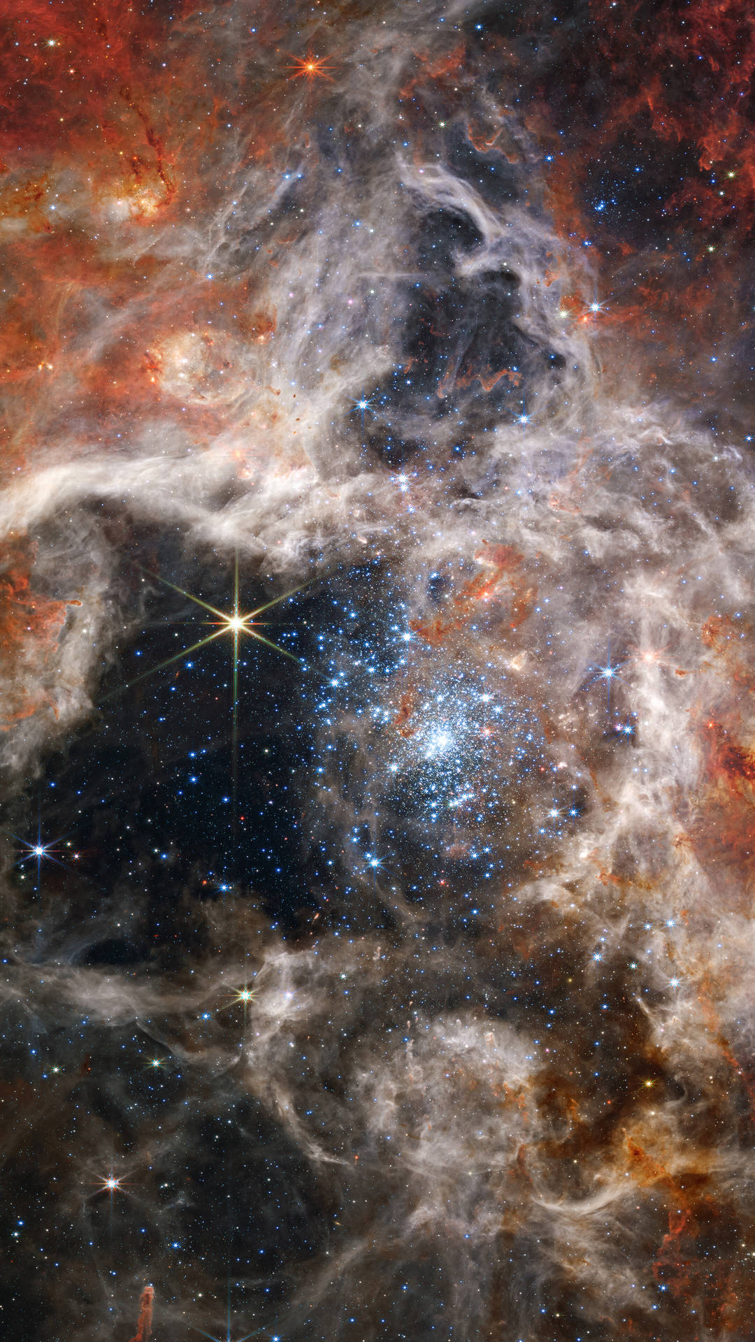 充滿活力的宇宙星雲，帶有發光的星星和旋轉的氣體和塵埃雲。 — 星雲 GIF 壁紙