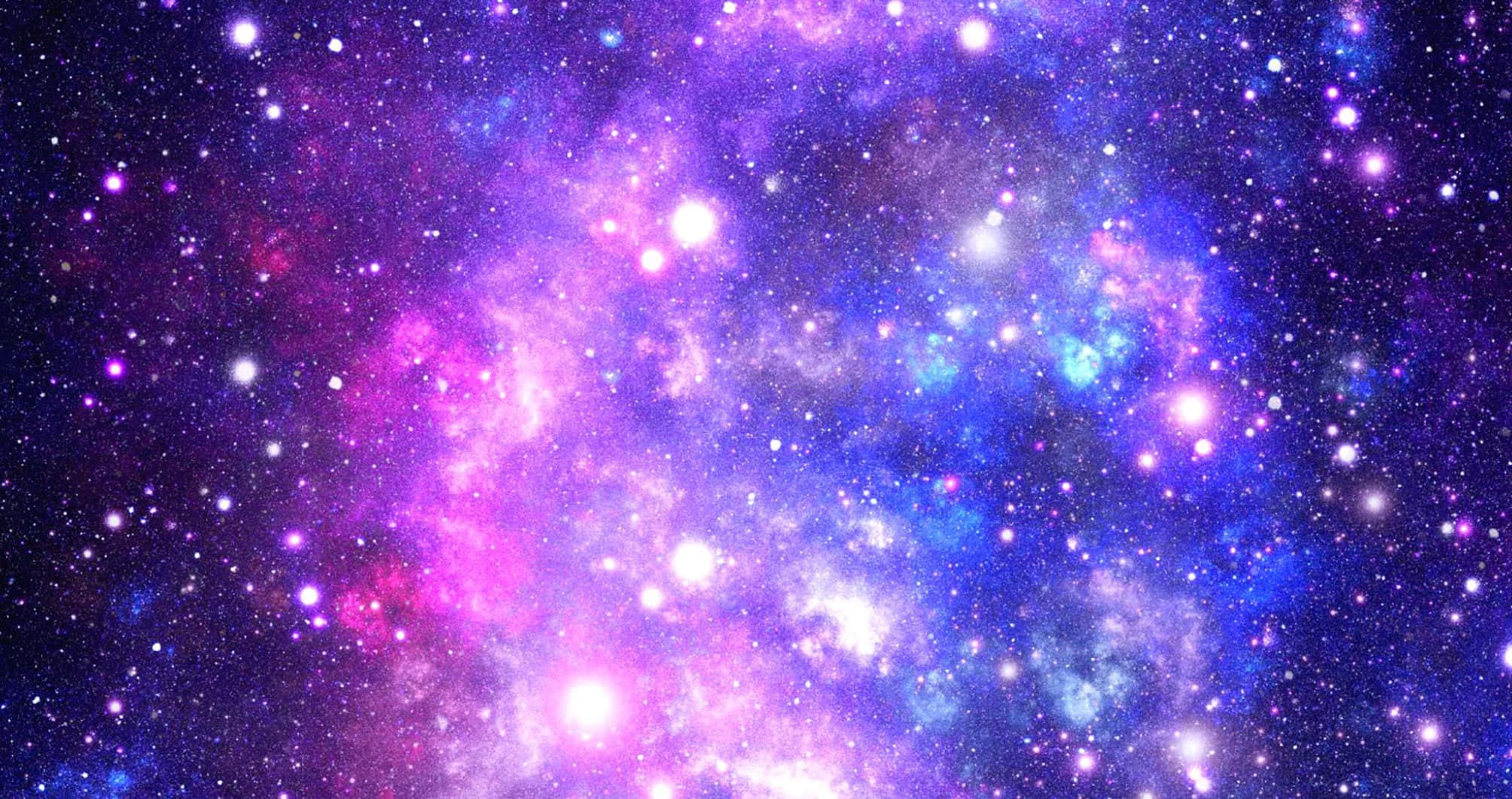 Galaxy Stars 桌布 壁紙 — 一個充滿活力的宇宙星雲，以粉紅色、紫色和藍色調旋轉，點綴著發光的星星，背景是黑暗的太空。