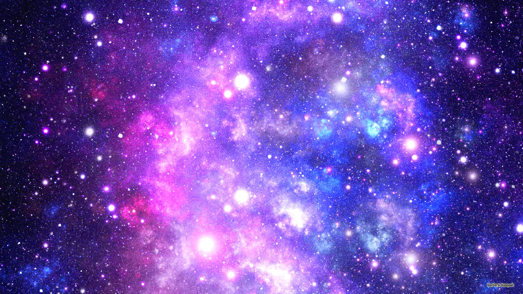 銀河 桌布 壁紙 — 一個充滿活力的宇宙星雲，以粉紅色、紫色和藍色調旋轉，點綴著發光的星星，映襯著黑暗的虛空。