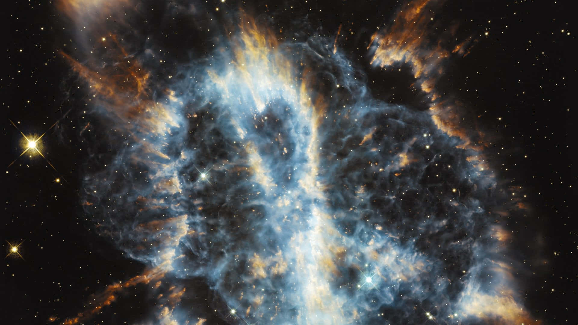 Nasa Galaxy 桌布 壁紙 — 一個充滿活力的宇宙星雲，在黑暗虛空中由明亮恆星照亮的旋轉藍色和橙色氣體。