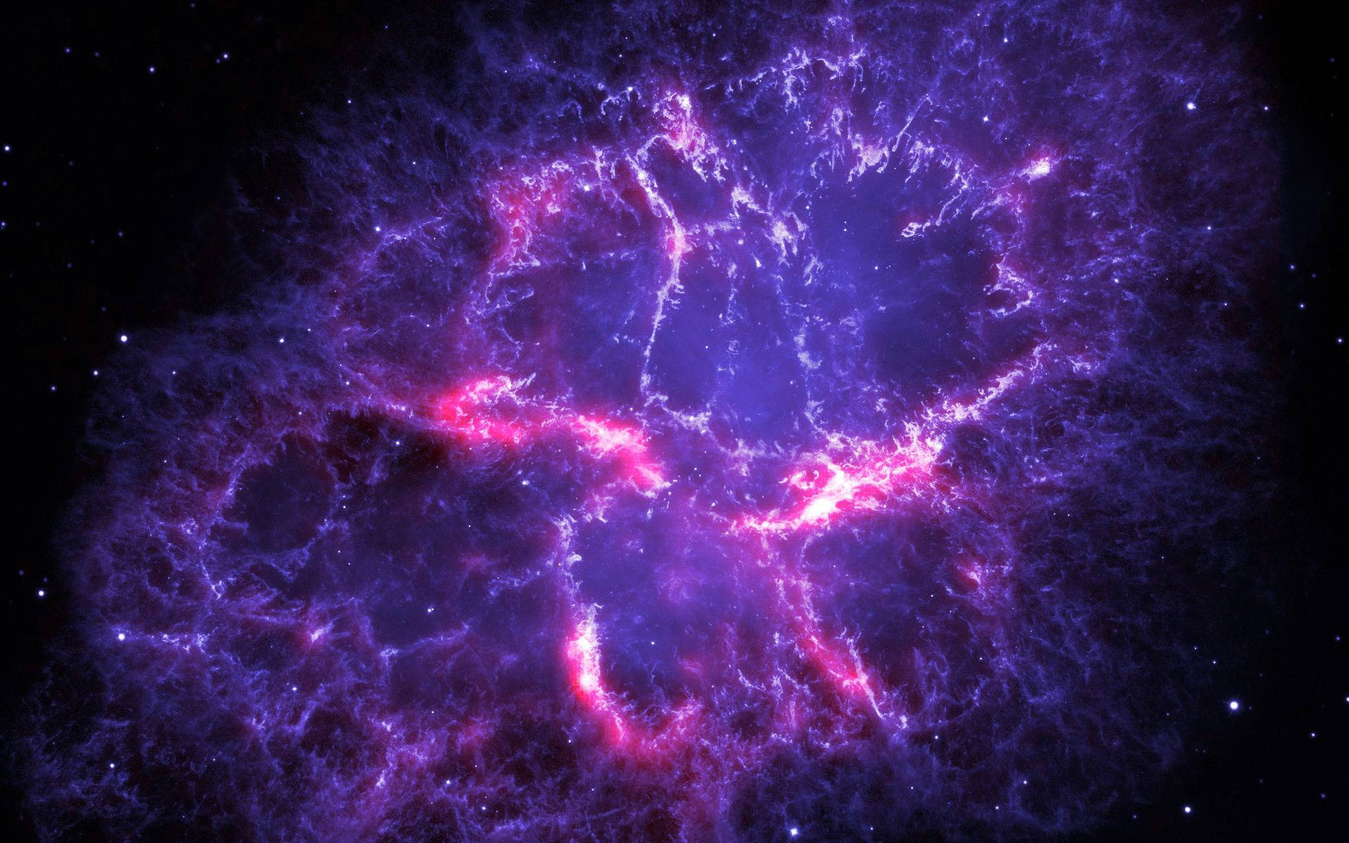NASA 動態圖片 桌布 壁紙 — 一個充滿活力的宇宙星雲，帶有電紫色和粉紅色的卷鬚，在佈滿星星的黑色虛空中發光。
