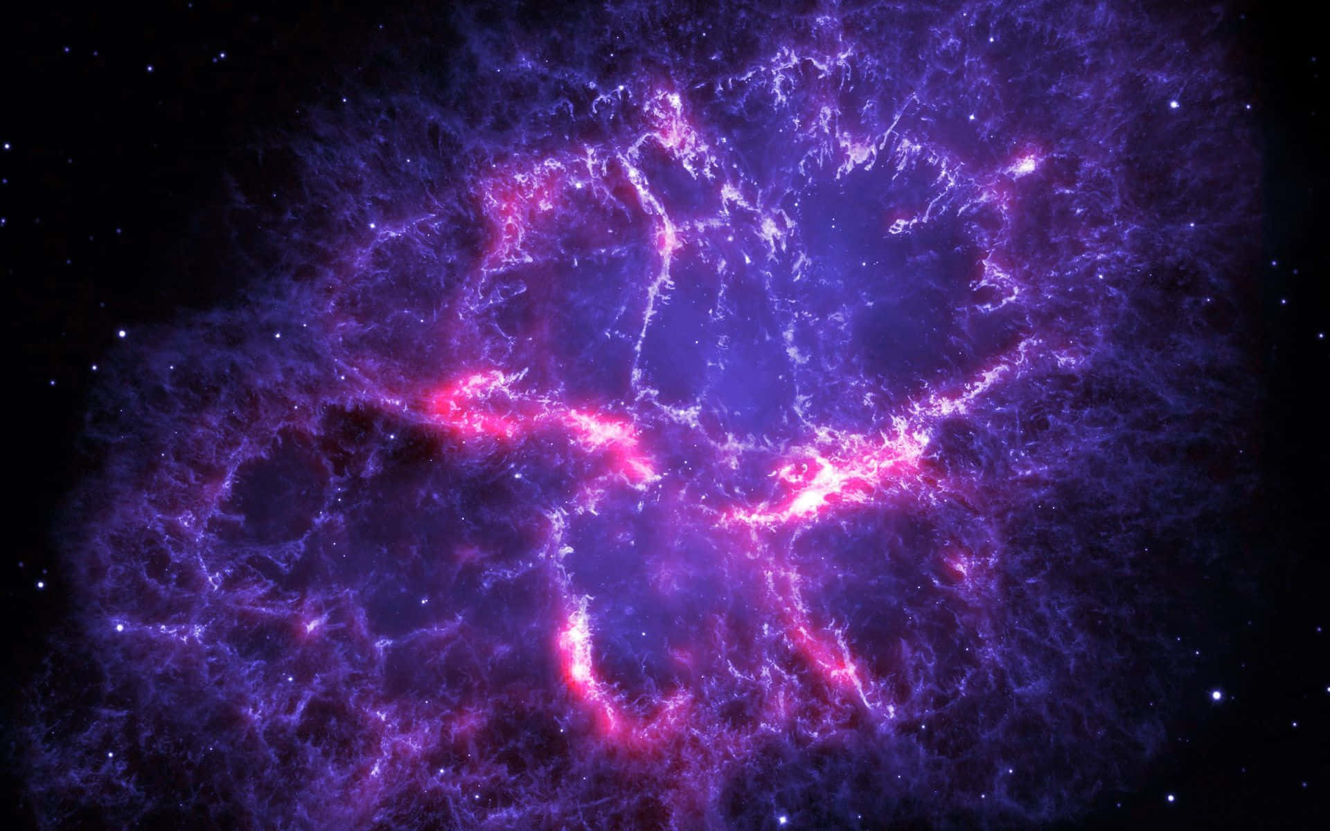 Real Space 桌布 壁紙 — 一個充滿活力的宇宙星雲，帶有電紫色和粉紅色的卷鬚，在佈滿星星的黑色虛空中發光。