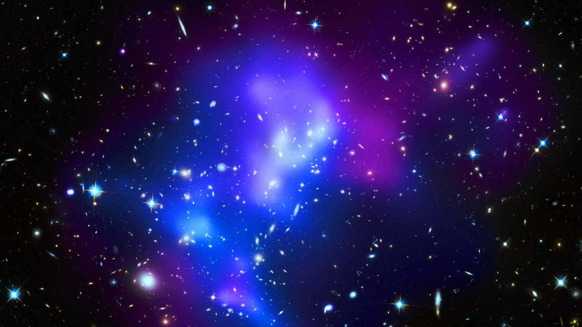深空中帶有藍紫色雲氣和閃爍星星的充滿活力的宇宙星雲。 — 可愛的銀河動圖 壁紙