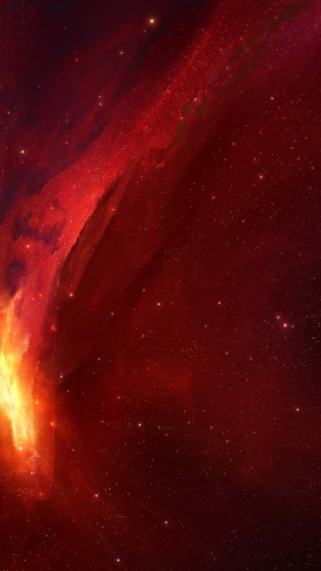 紅色動圖 桌布 壁紙 — 一個充滿活力的宇宙星雲在深紅色和火橙色中旋轉，背景是星場。