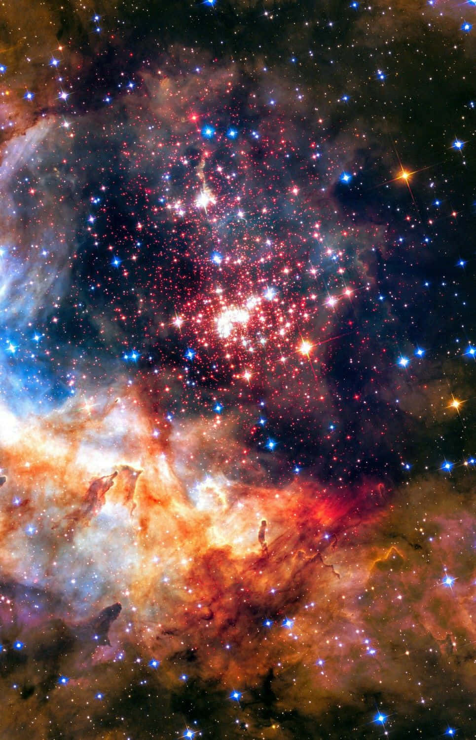 Star Cluster 桌布 壁紙 — 一個充滿活力的宇宙星雲在黑暗虛空中爆發，呈現紅色、橙色和藍色的恆星。