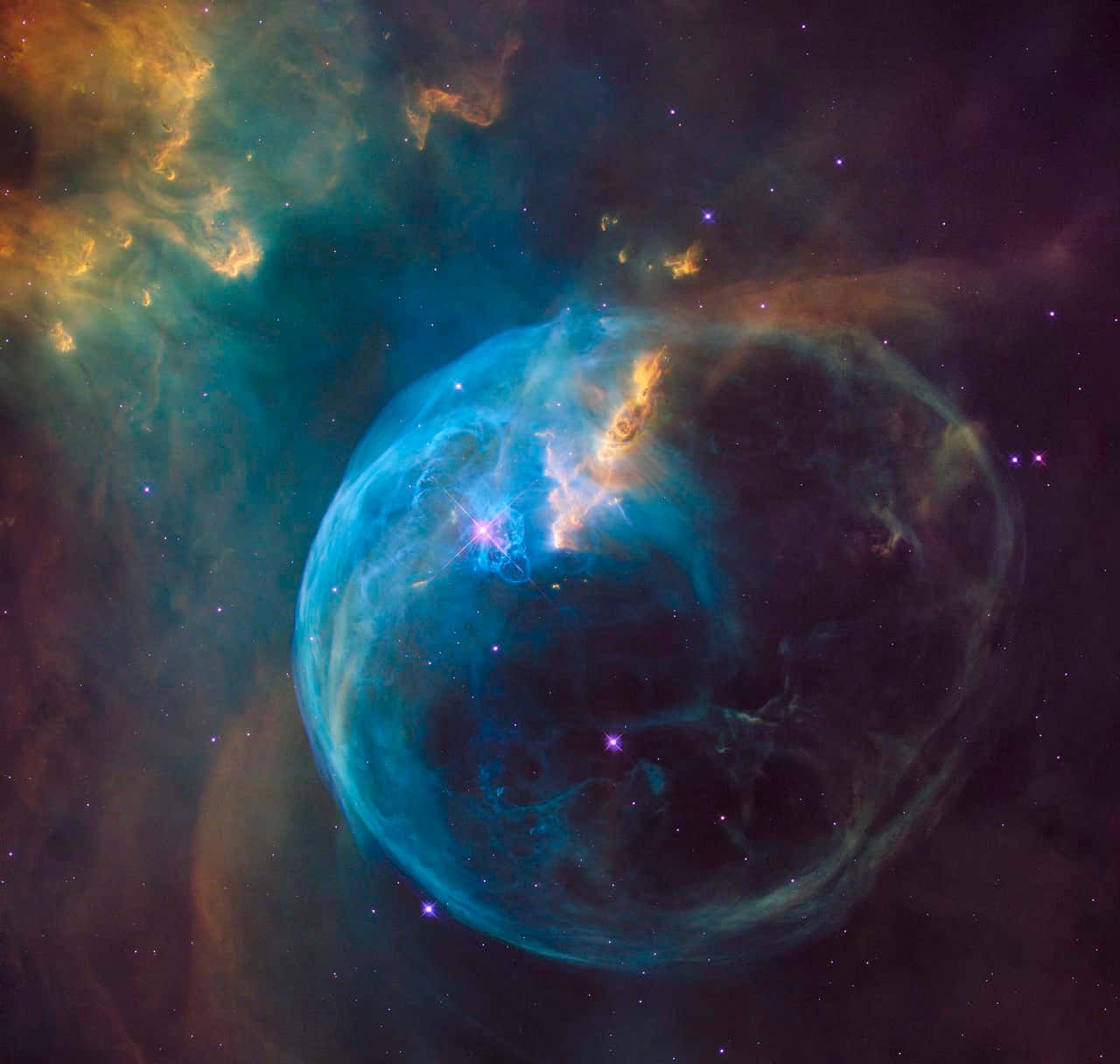 星雲 桌布 壁紙 — 一個充滿活力的宇宙泡泡星雲，在星空背景下散發著藍色、藍綠色和橙色的光芒。