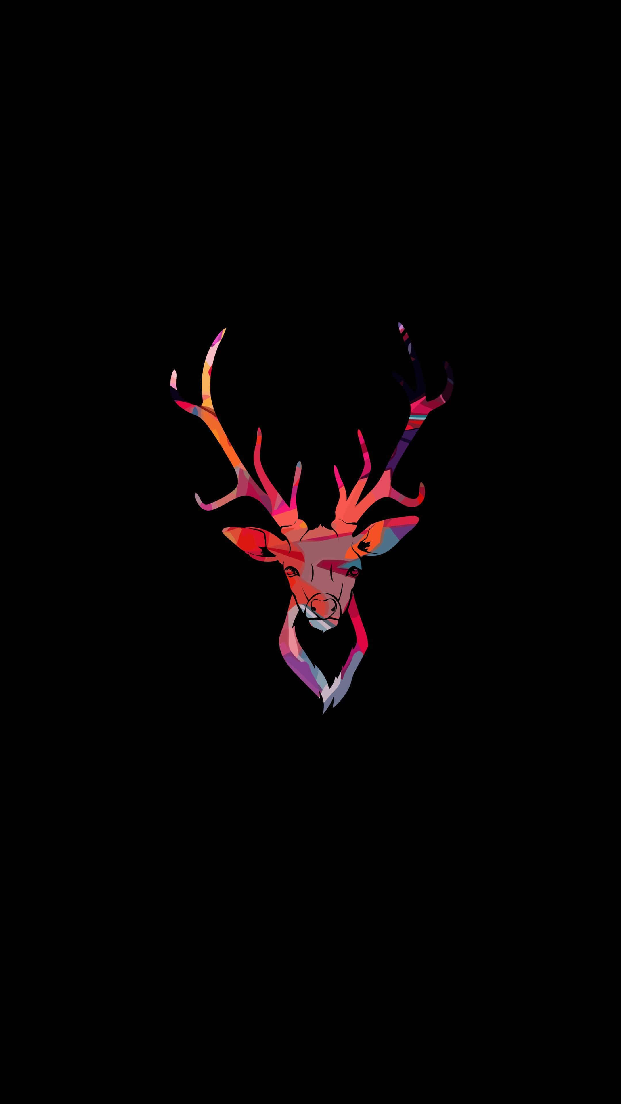 Cool Deer 桌布 壁紙 — 一個充滿活力的幾何鹿頭，帶有火熱的橙色、粉紅色和紫色色調，在純黑色背景下脫穎而出。