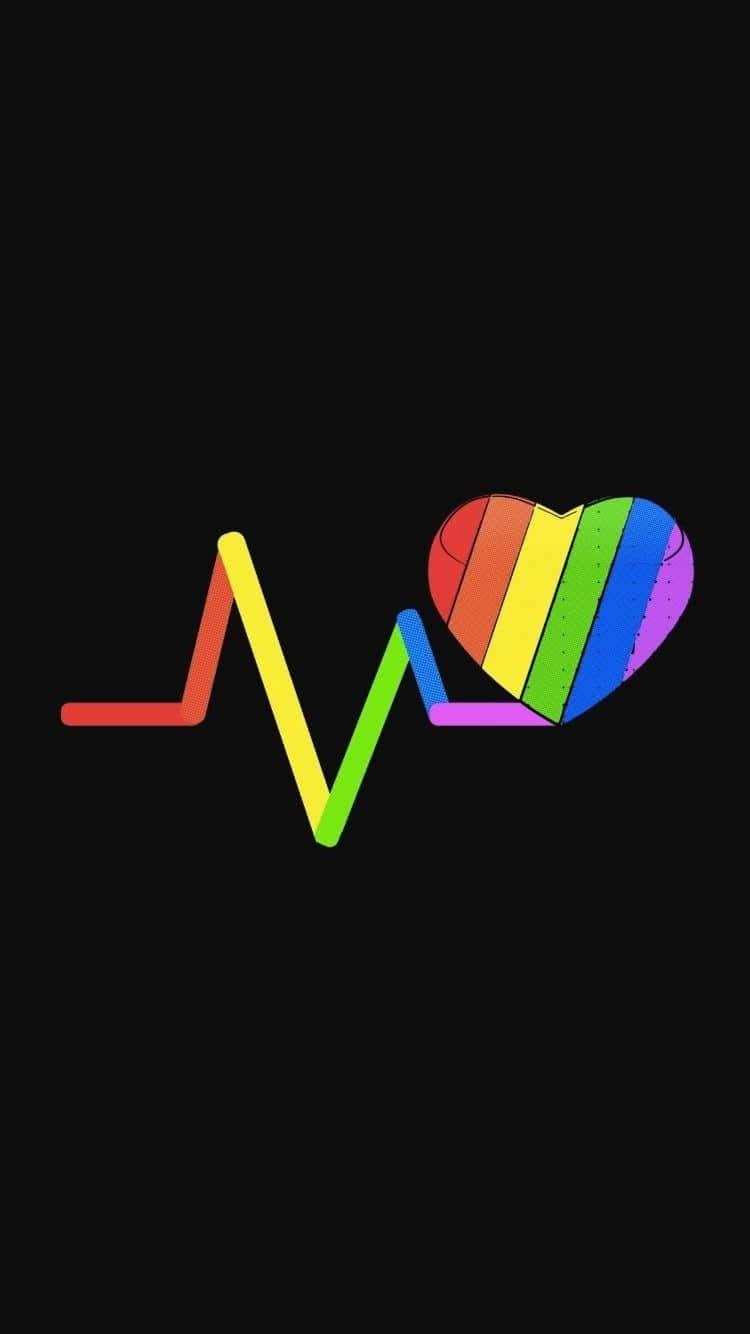 Heartbeat 桌布 壁紙 — 一個充滿活力的彩虹心臟在純黑背景上，隨著色彩繽紛的心跳線跳動。